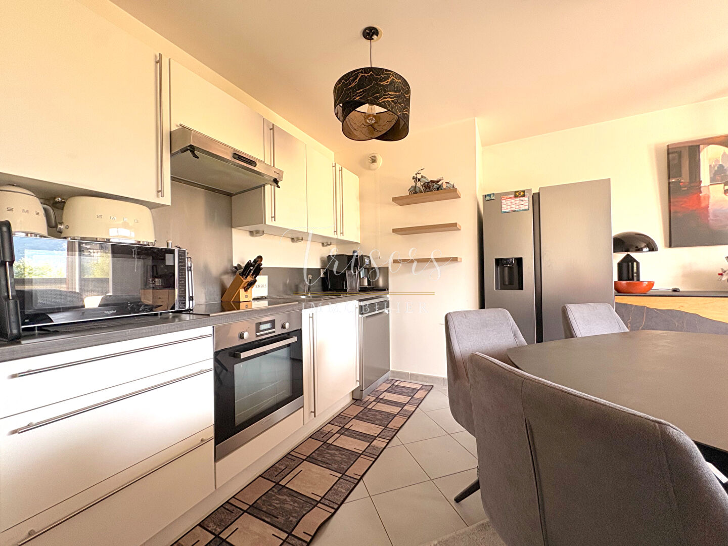 Photo 2 — TRESORS IMMOBILIER