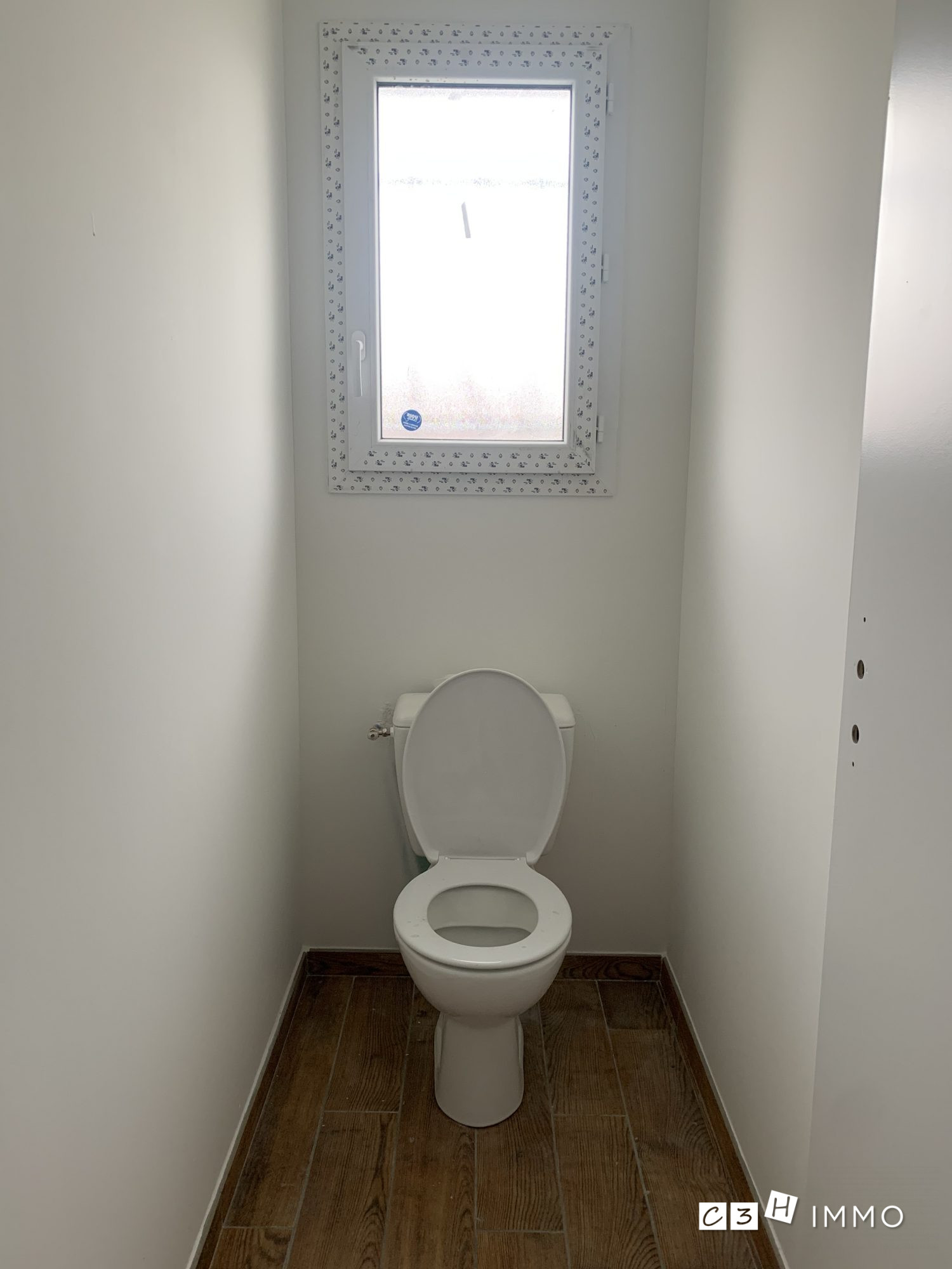Photo 10 — C3H IMMO