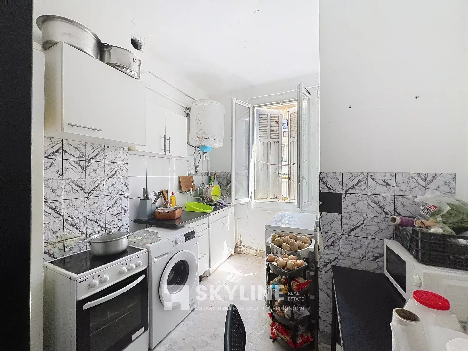 Photo 2 — SKYLINE REAL ESTATE