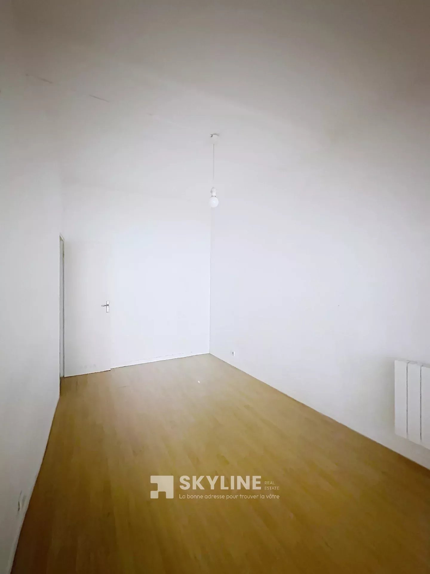 Photo 3 — SKYLINE REAL ESTATE