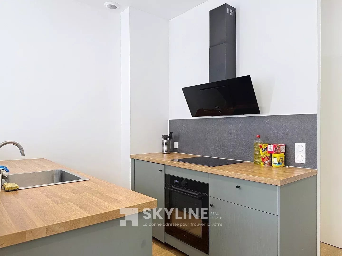 Photo 3 — SKYLINE REAL ESTATE