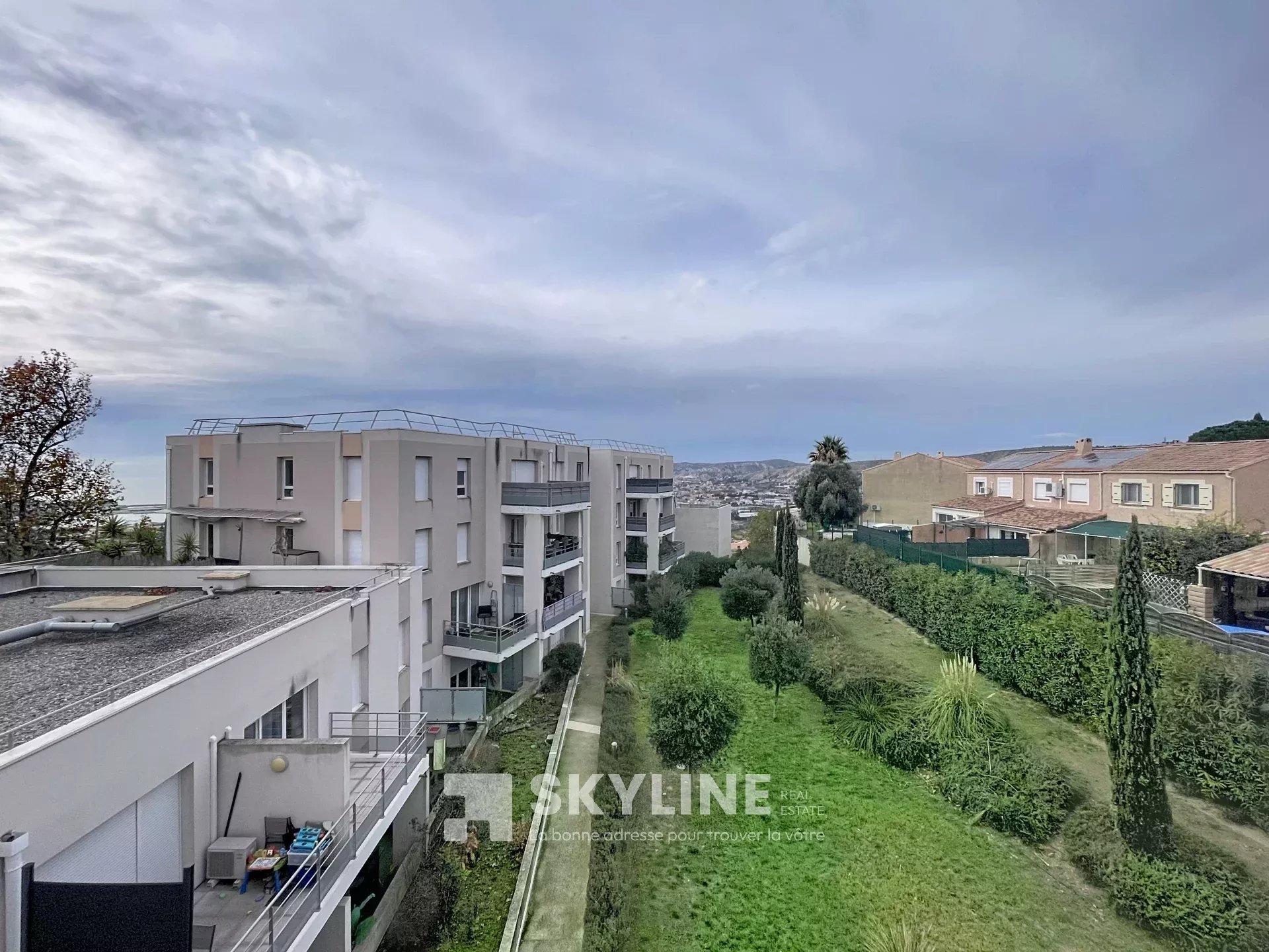 Photo 2 — SKYLINE REAL ESTATE
