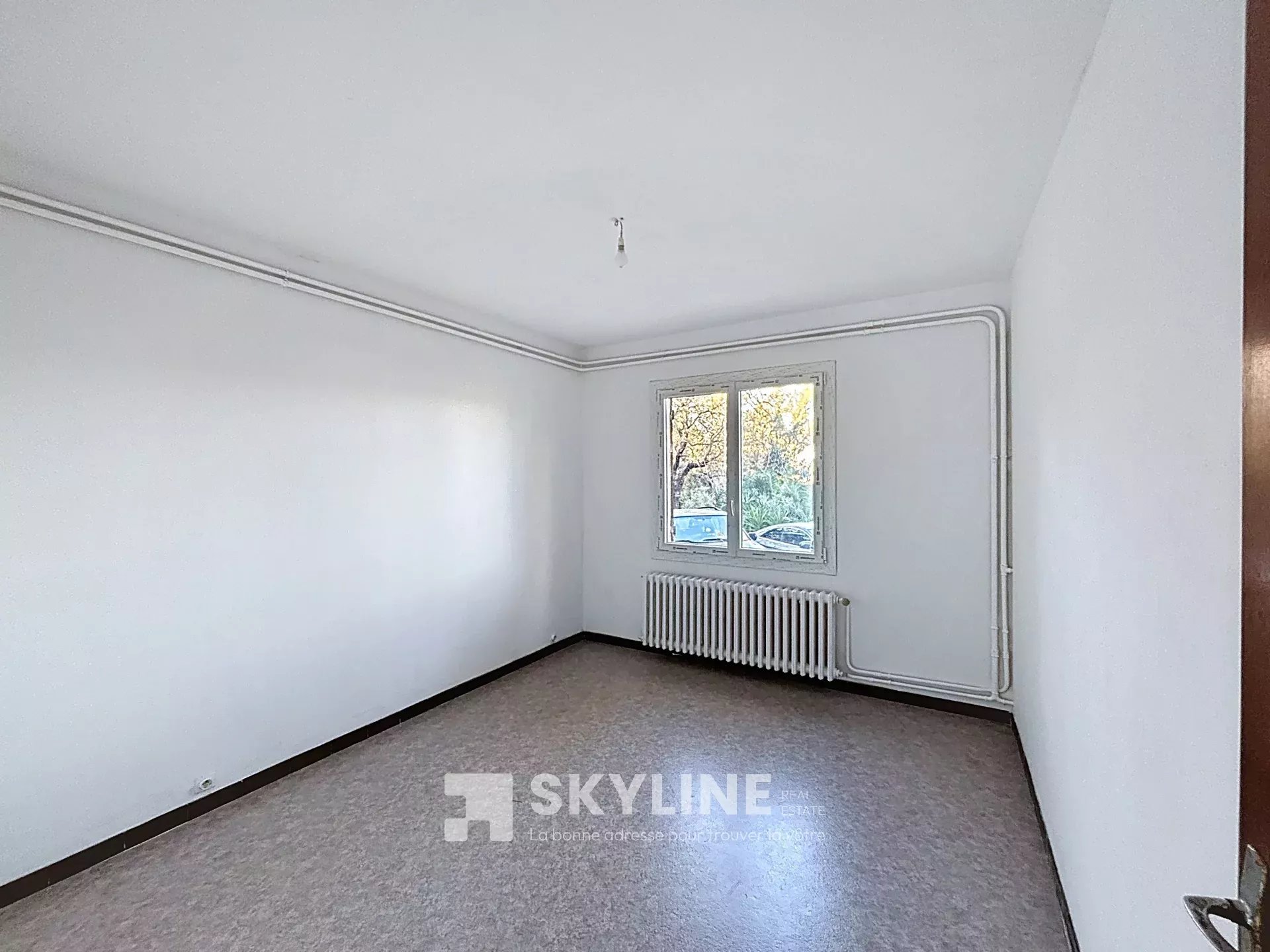 Photo 6 — SKYLINE REAL ESTATE