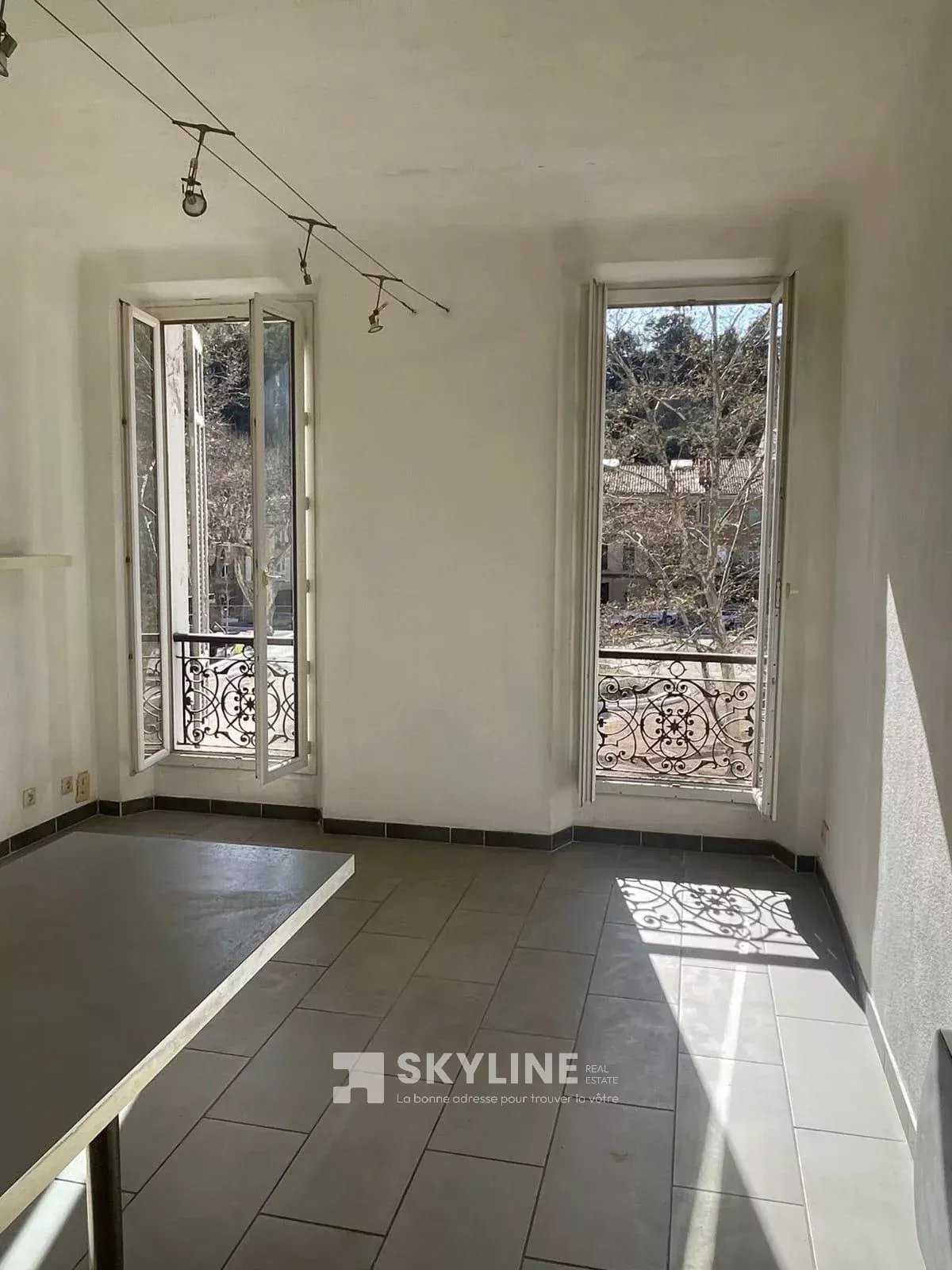 Photo 3 — SKYLINE REAL ESTATE