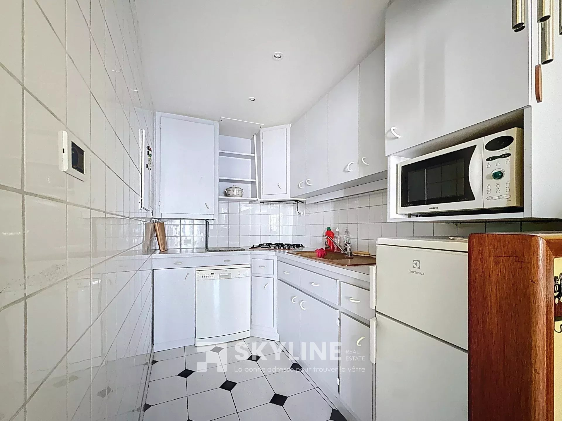 Photo 3 — SKYLINE REAL ESTATE