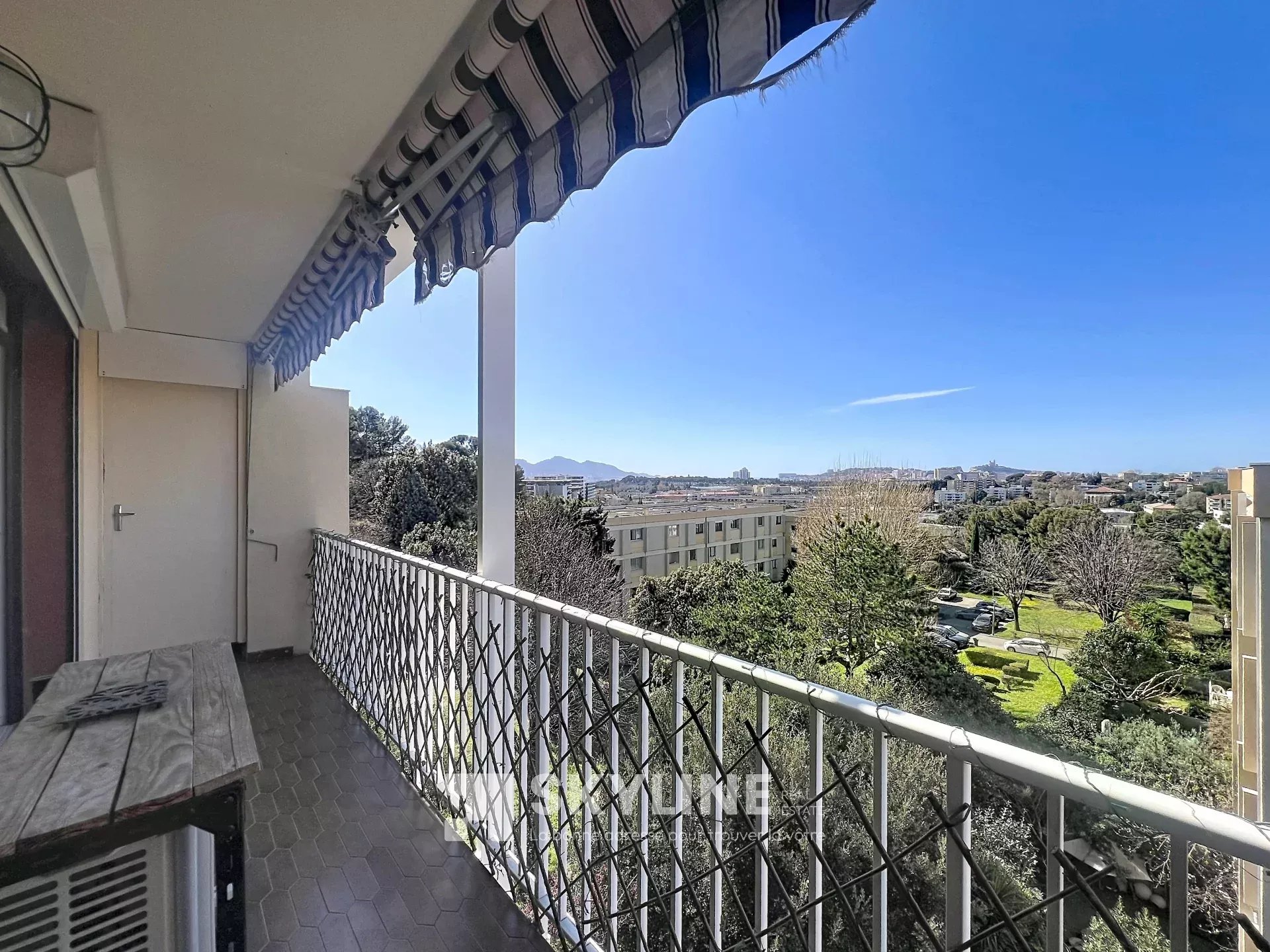 Photo 2 — SKYLINE REAL ESTATE