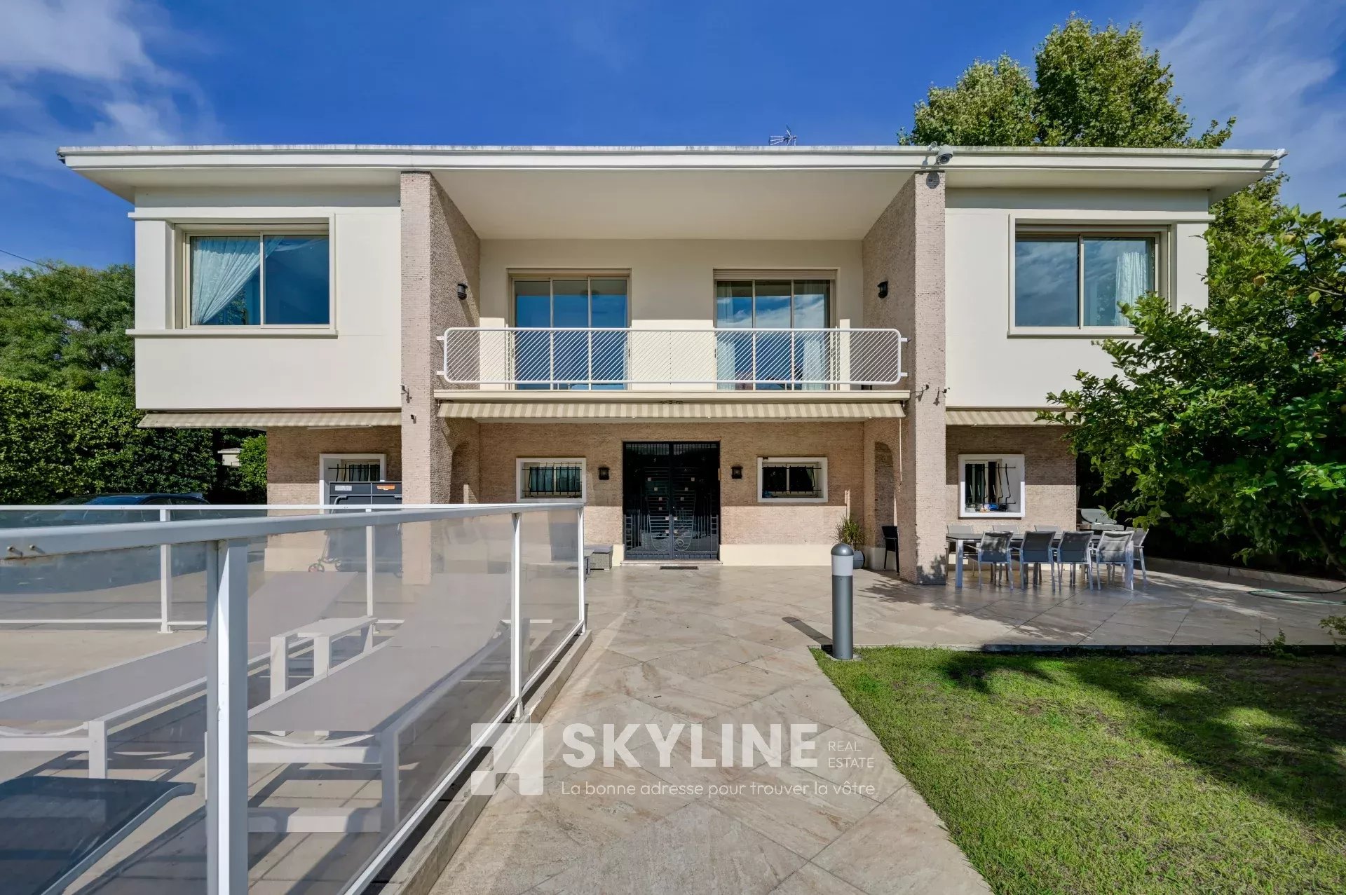 Photo 3 — SKYLINE REAL ESTATE