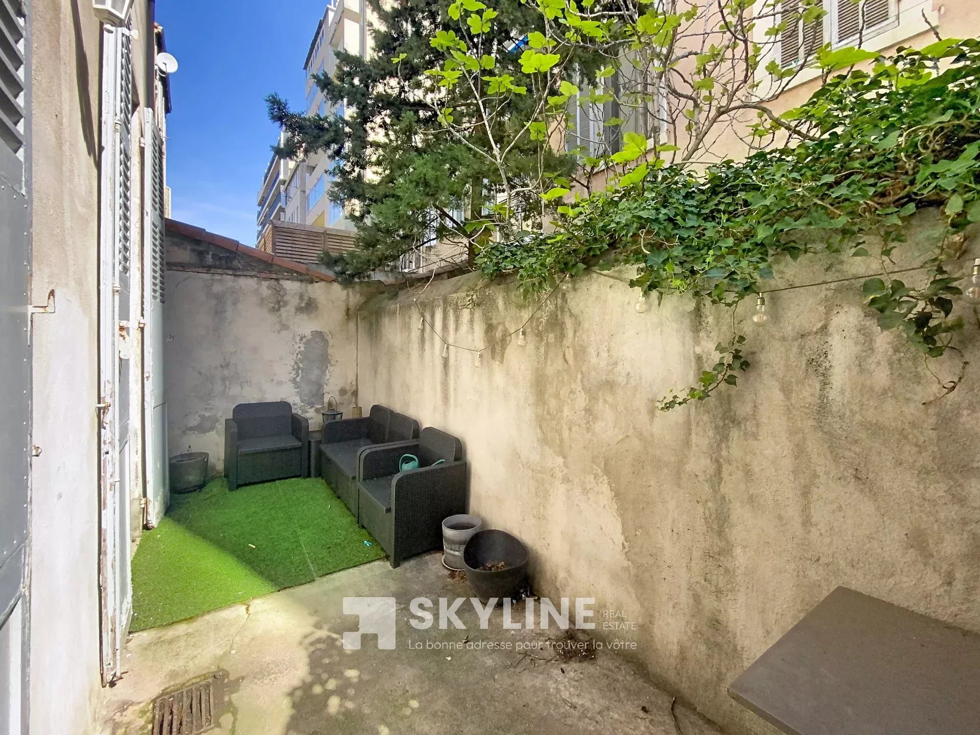 Photo 2 — SKYLINE REAL ESTATE