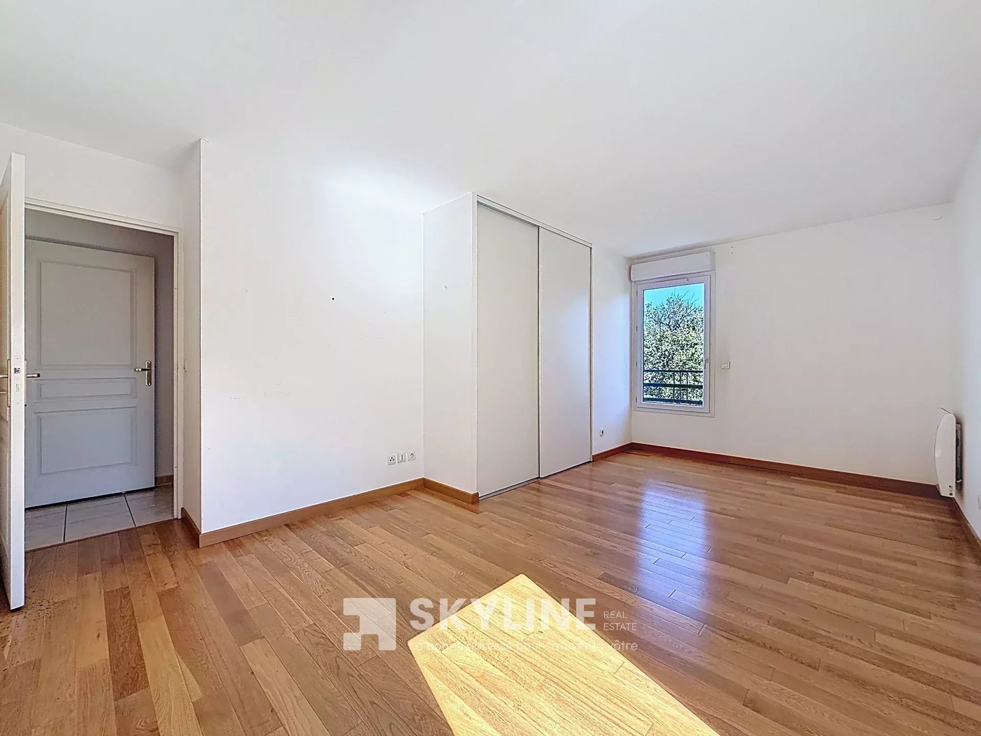 Photo 2 — SKYLINE REAL ESTATE