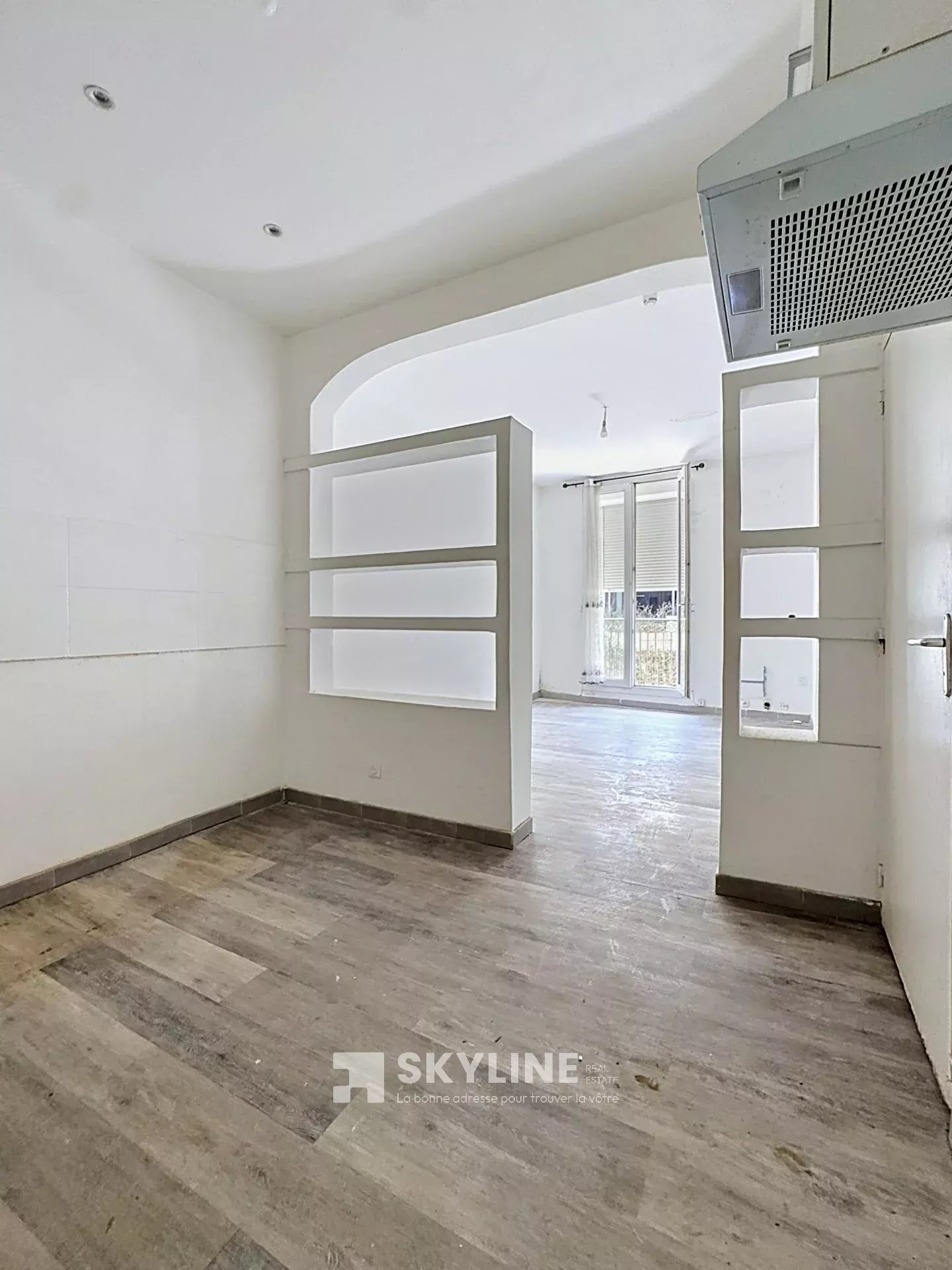 Photo 2 — SKYLINE REAL ESTATE