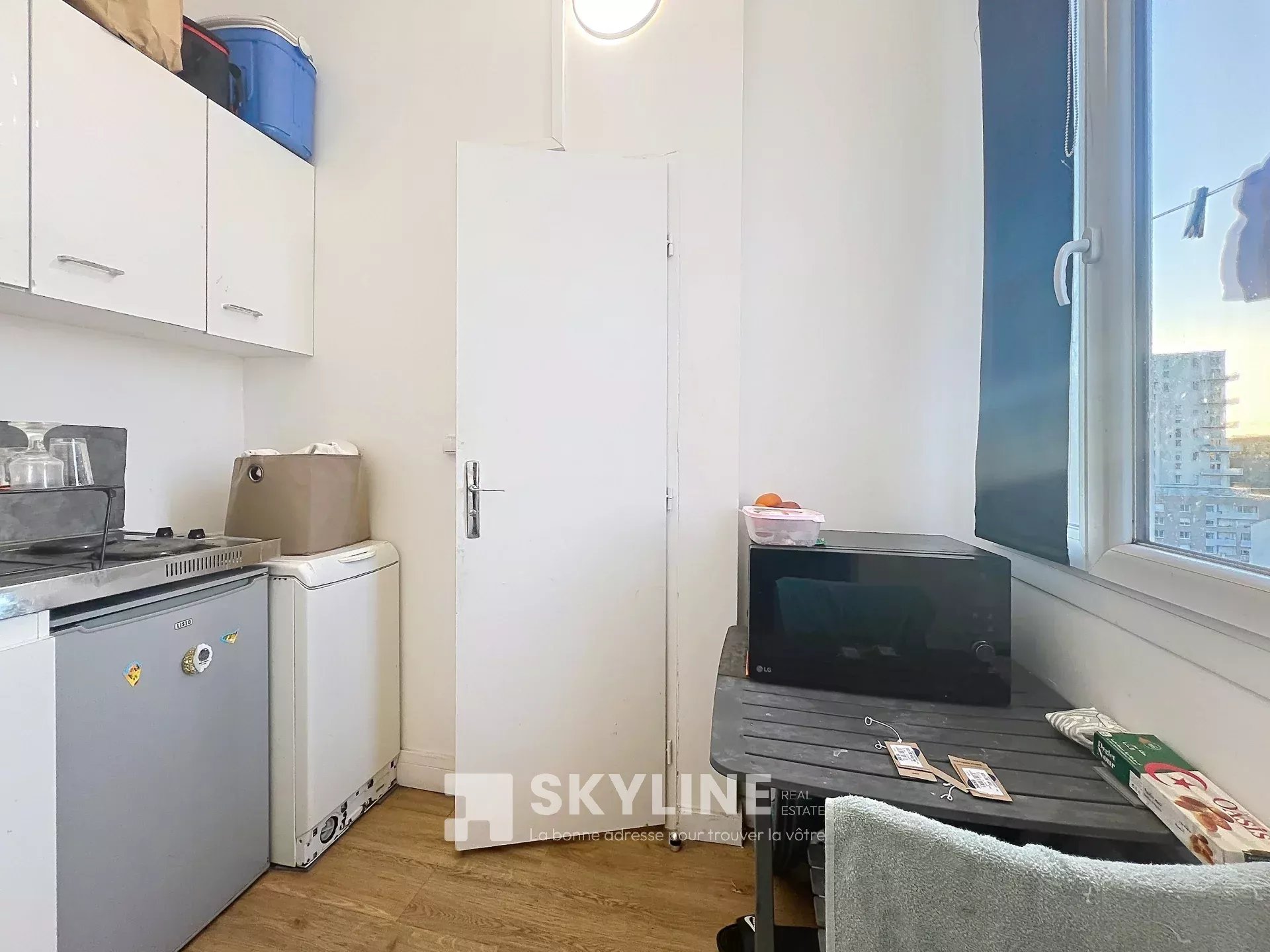 Photo 2 — SKYLINE REAL ESTATE