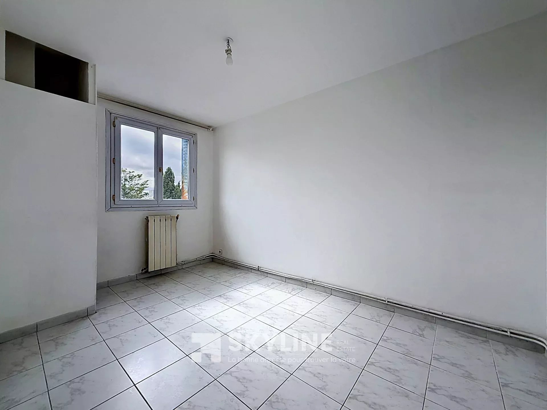 Photo 2 — SKYLINE REAL ESTATE