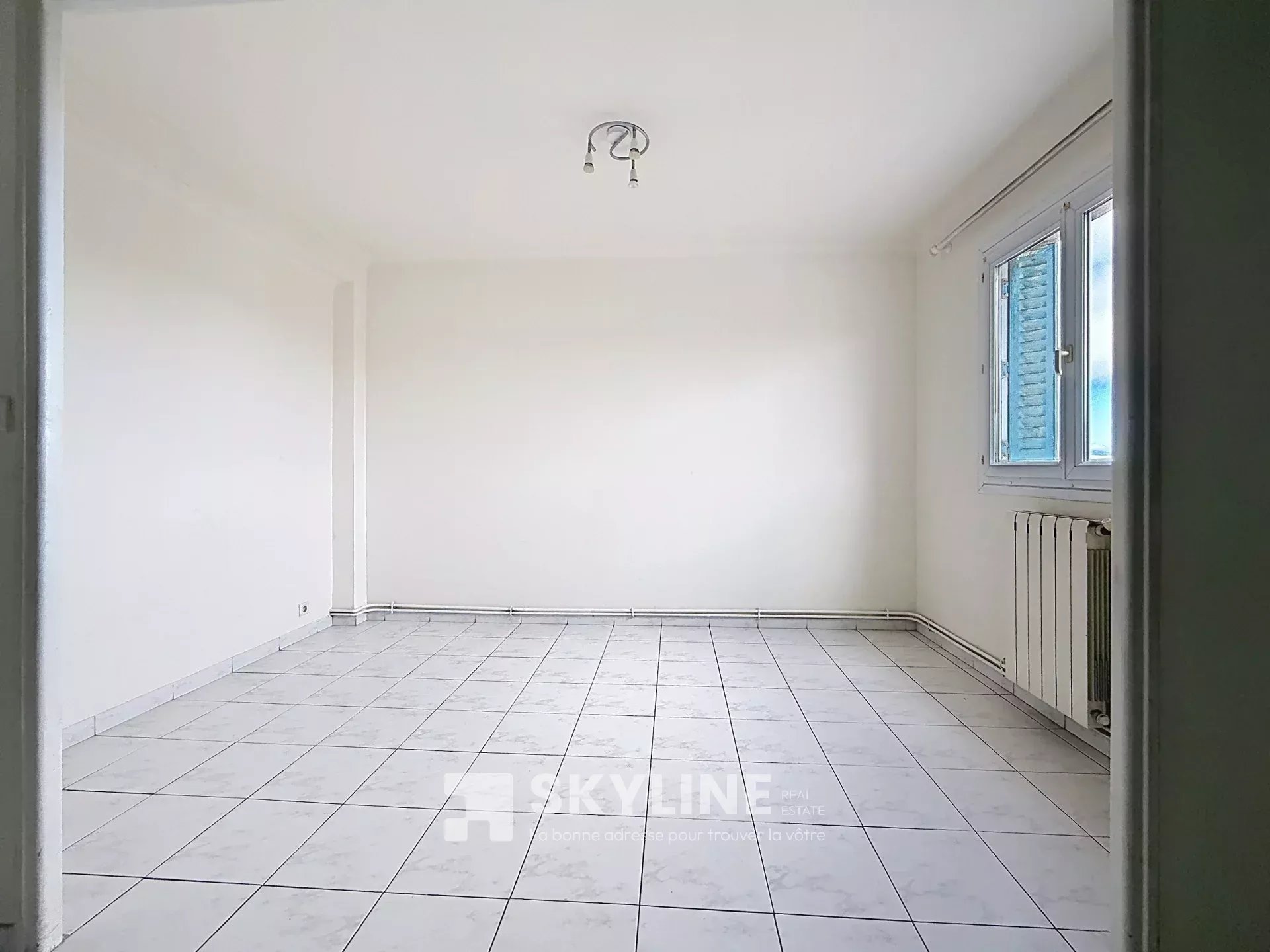 Photo 3 — SKYLINE REAL ESTATE