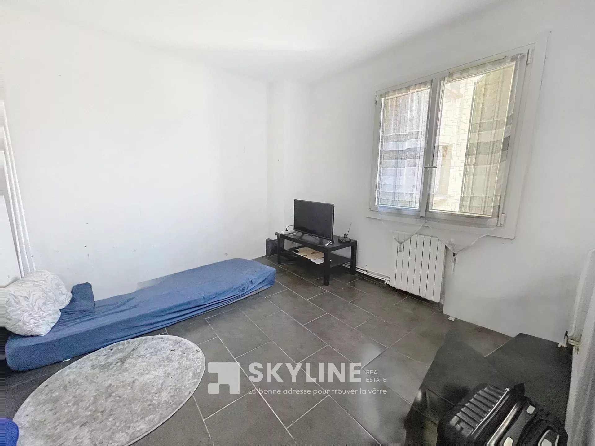 Photo 5 — SKYLINE REAL ESTATE