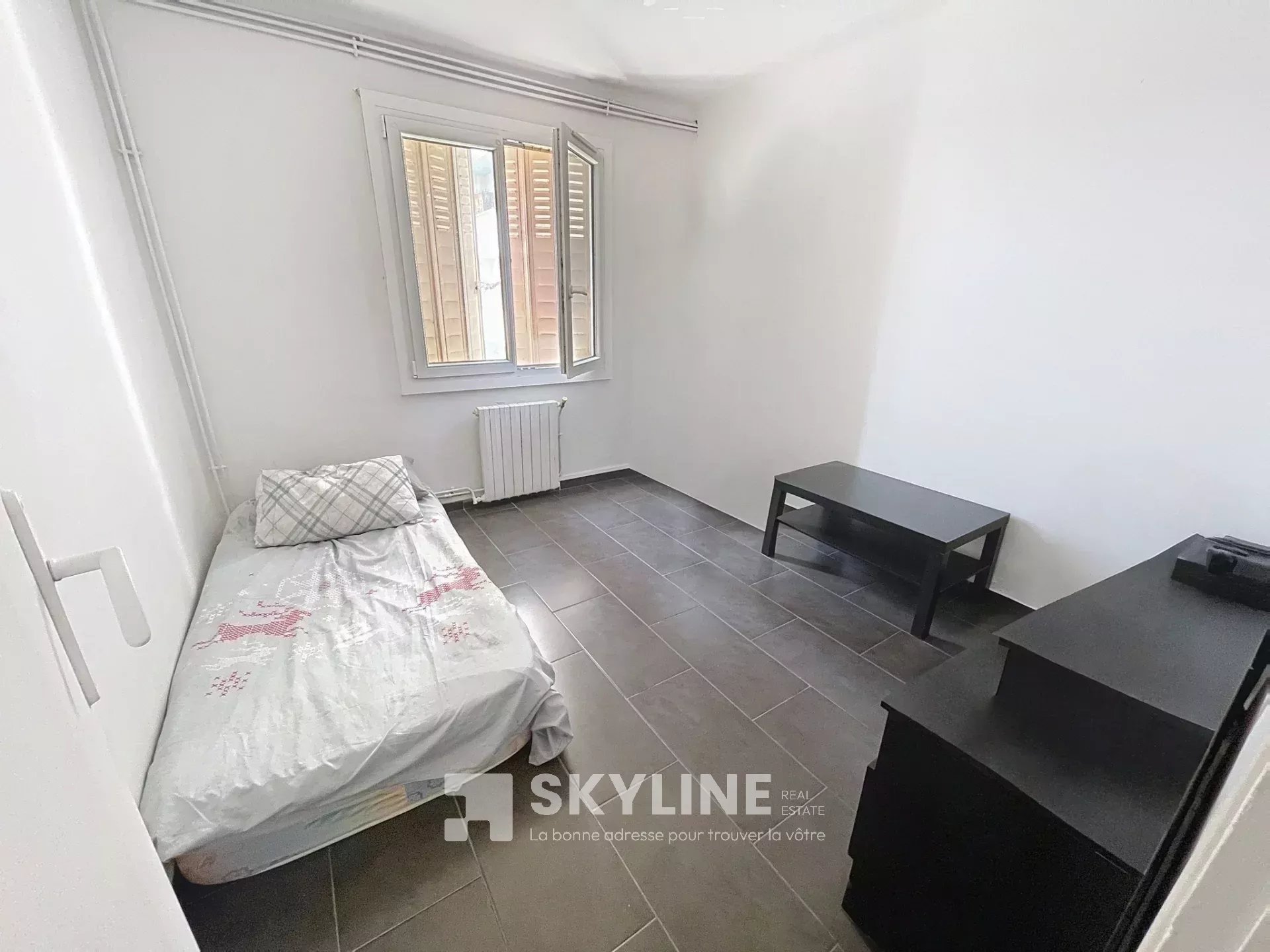Photo 3 — SKYLINE REAL ESTATE