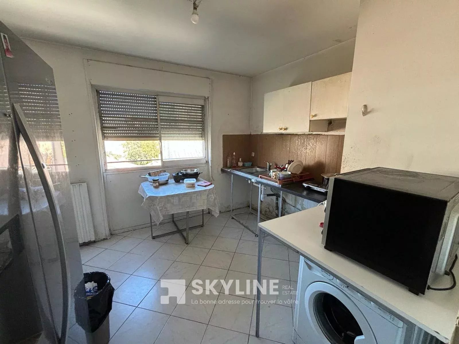 Photo 3 — SKYLINE REAL ESTATE