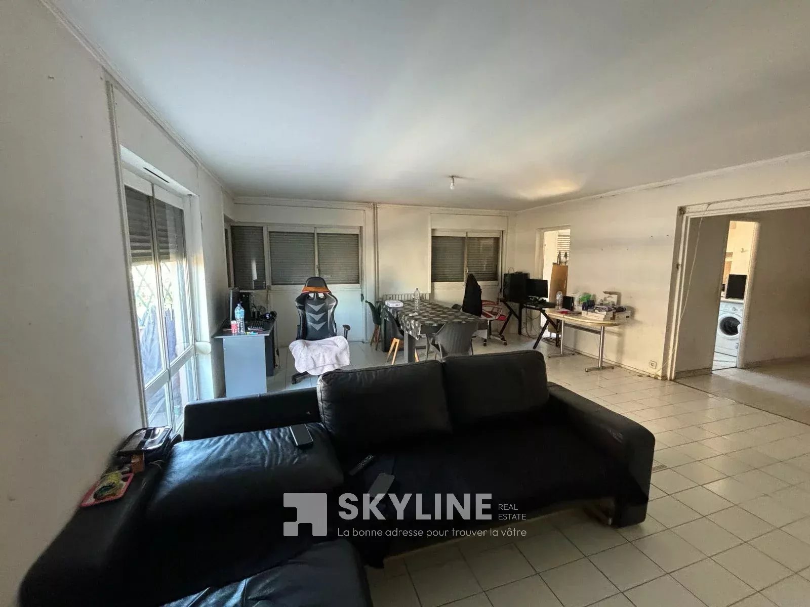 Photo 2 — SKYLINE REAL ESTATE