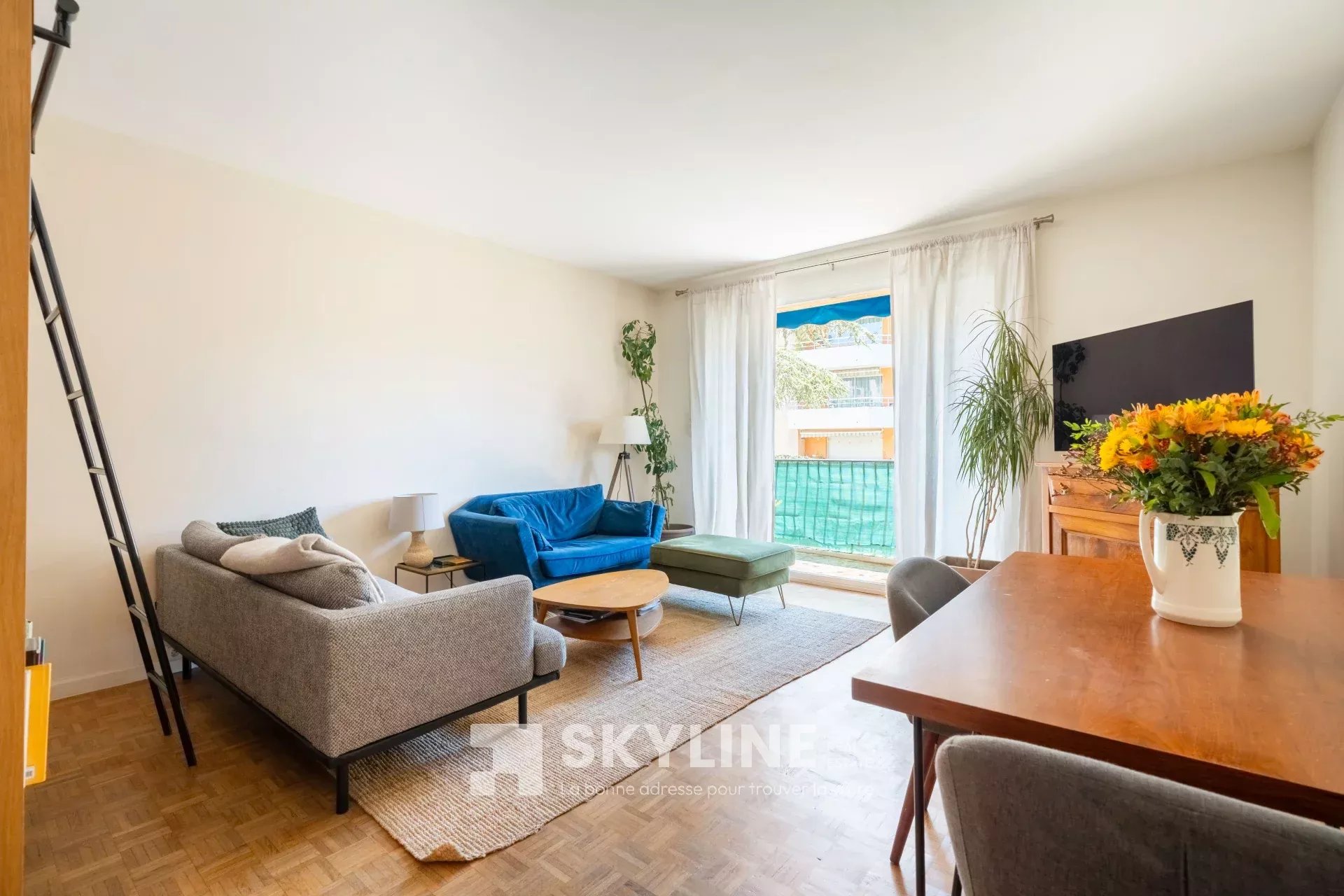 Photo 2 — SKYLINE REAL ESTATE