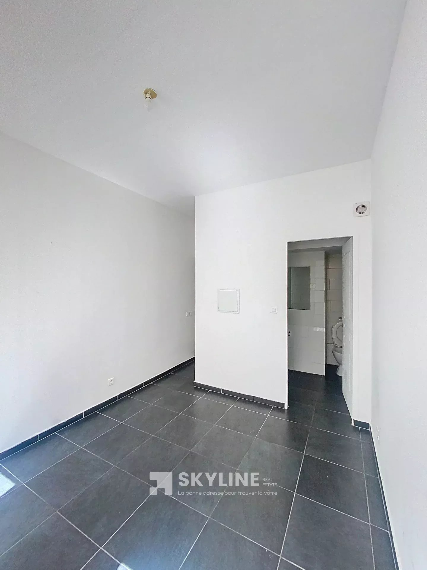 Photo 6 — SKYLINE REAL ESTATE