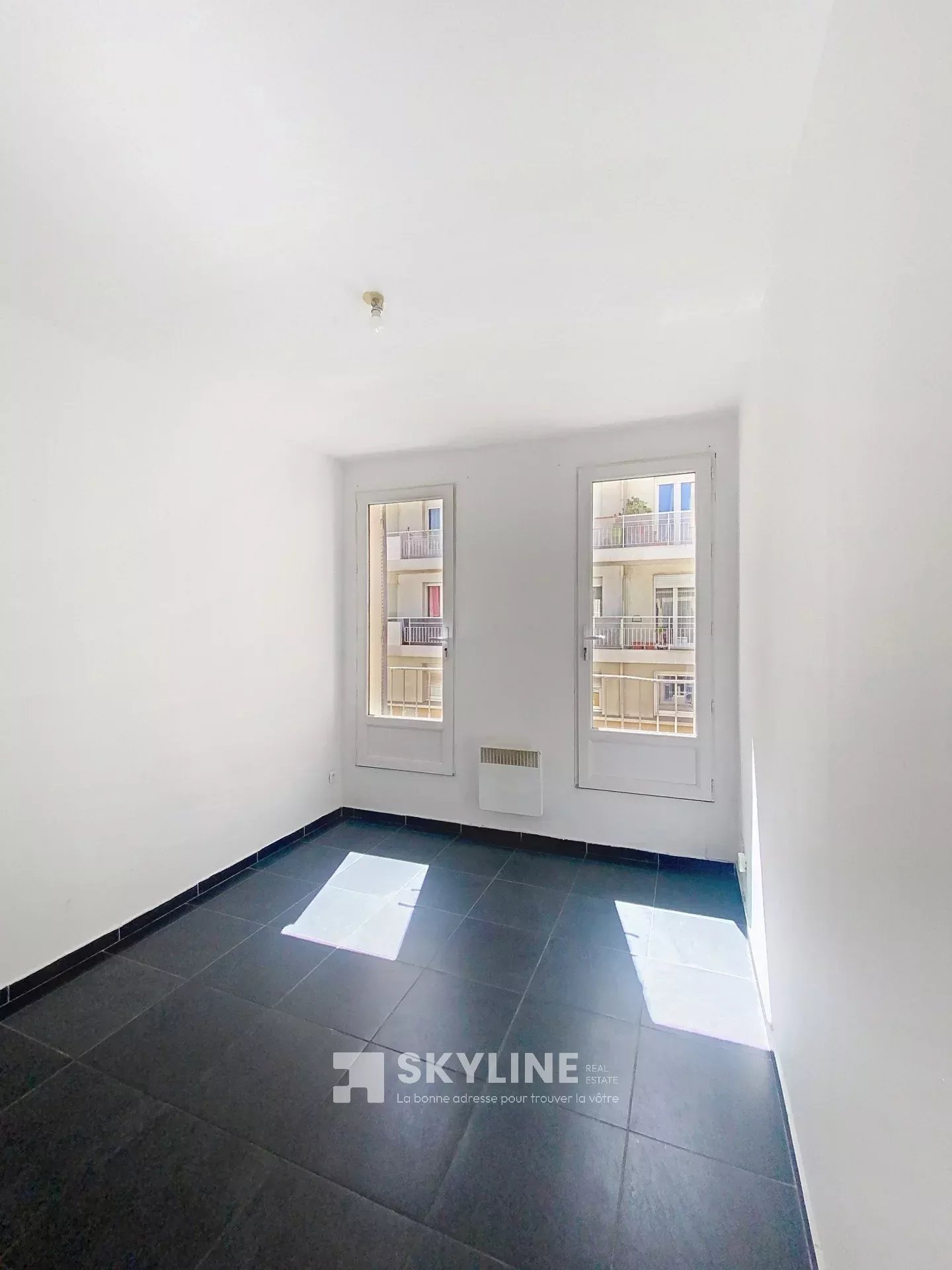 Photo 5 — SKYLINE REAL ESTATE