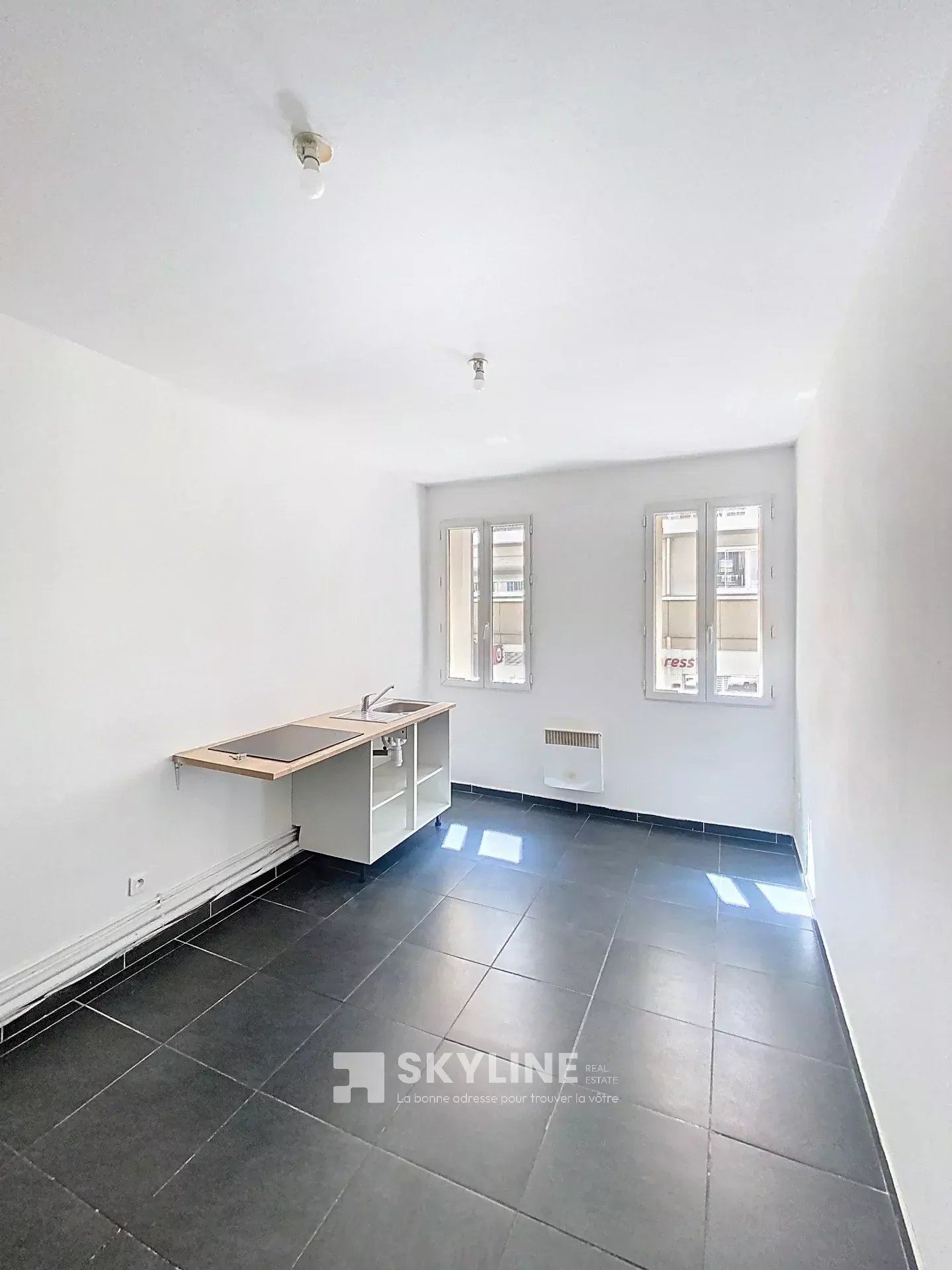 Photo 2 — SKYLINE REAL ESTATE