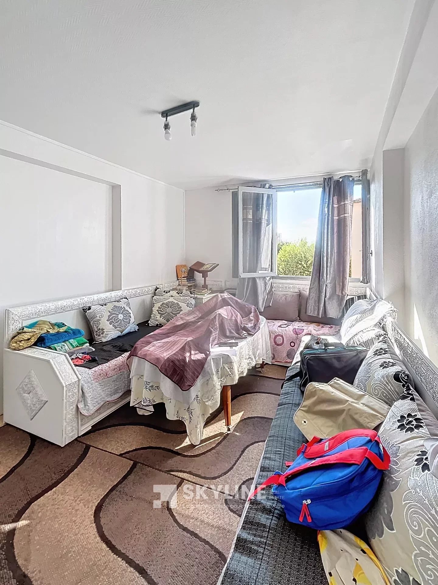 Photo 3 — SKYLINE REAL ESTATE