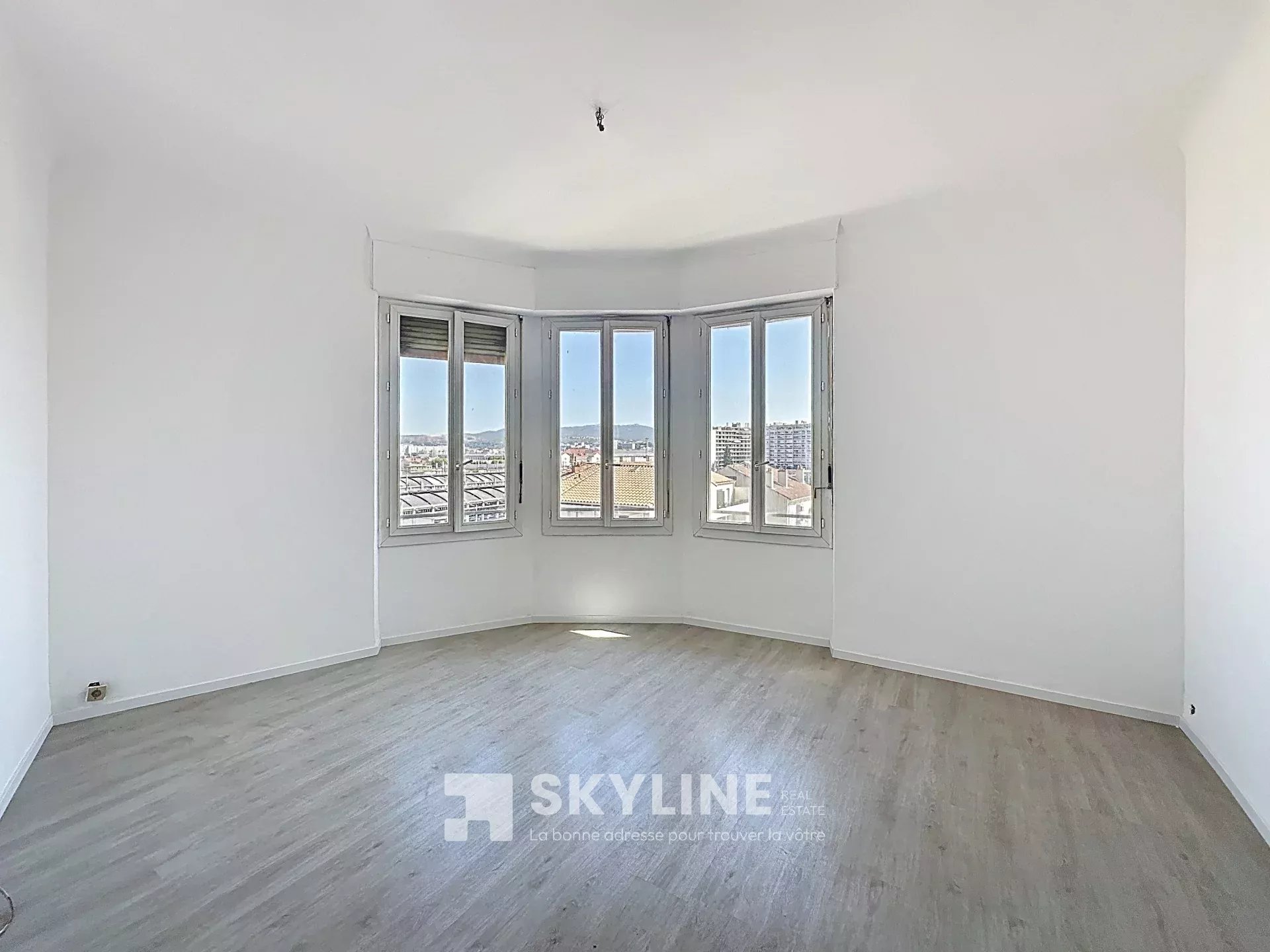 Photo 2 — SKYLINE REAL ESTATE