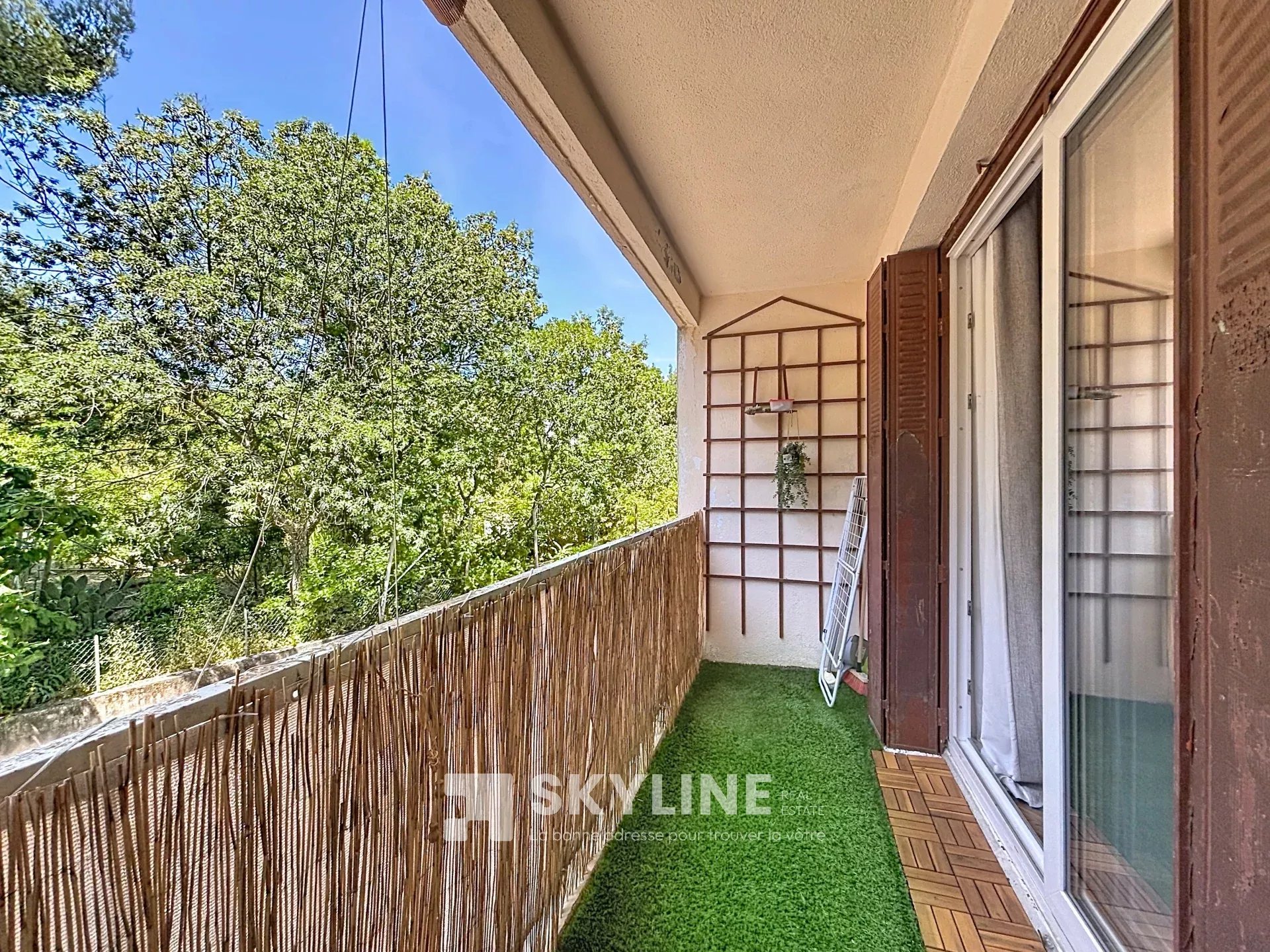 Photo 3 — SKYLINE REAL ESTATE
