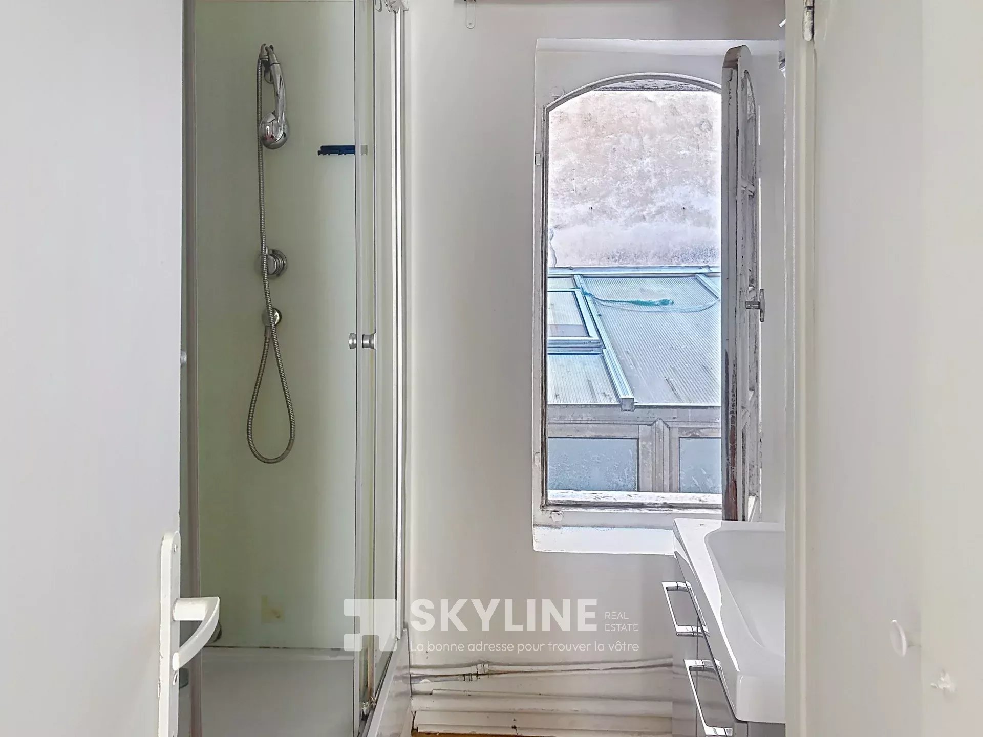 Photo 2 — SKYLINE REAL ESTATE