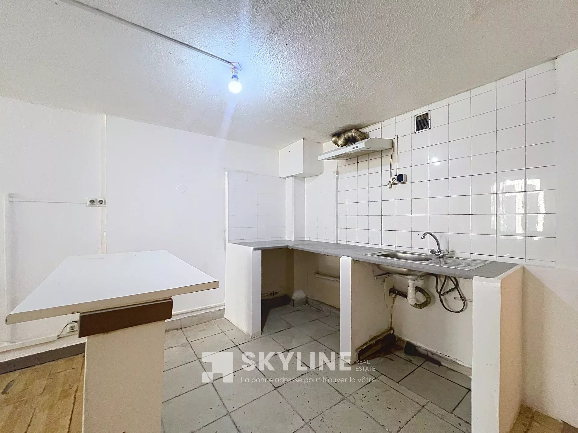Photo 3 — SKYLINE REAL ESTATE
