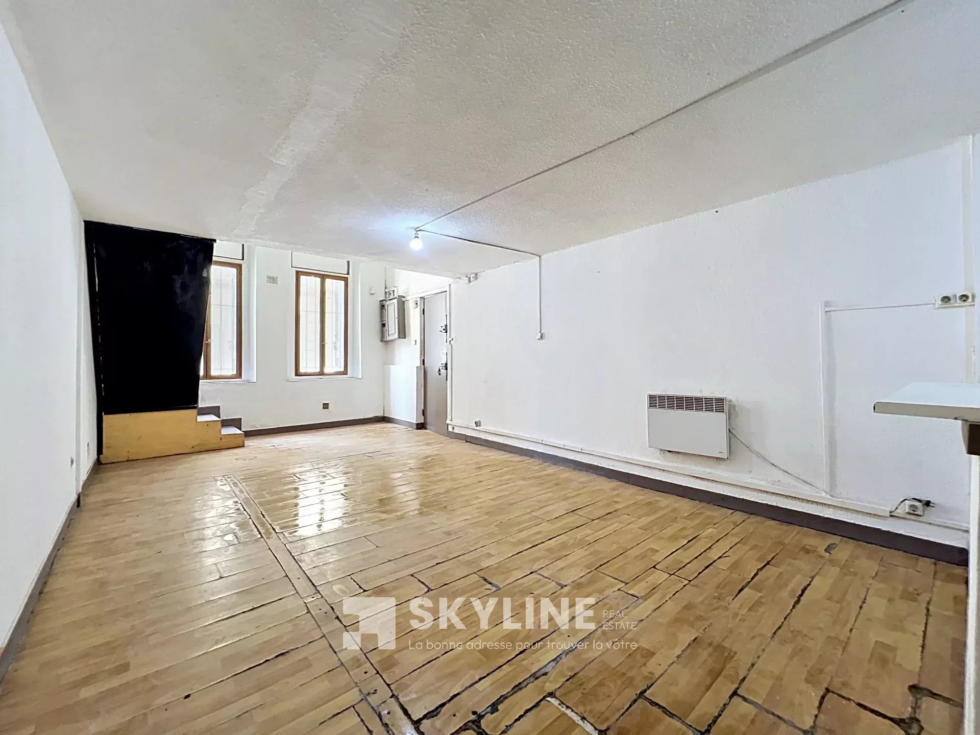 Photo 2 — SKYLINE REAL ESTATE