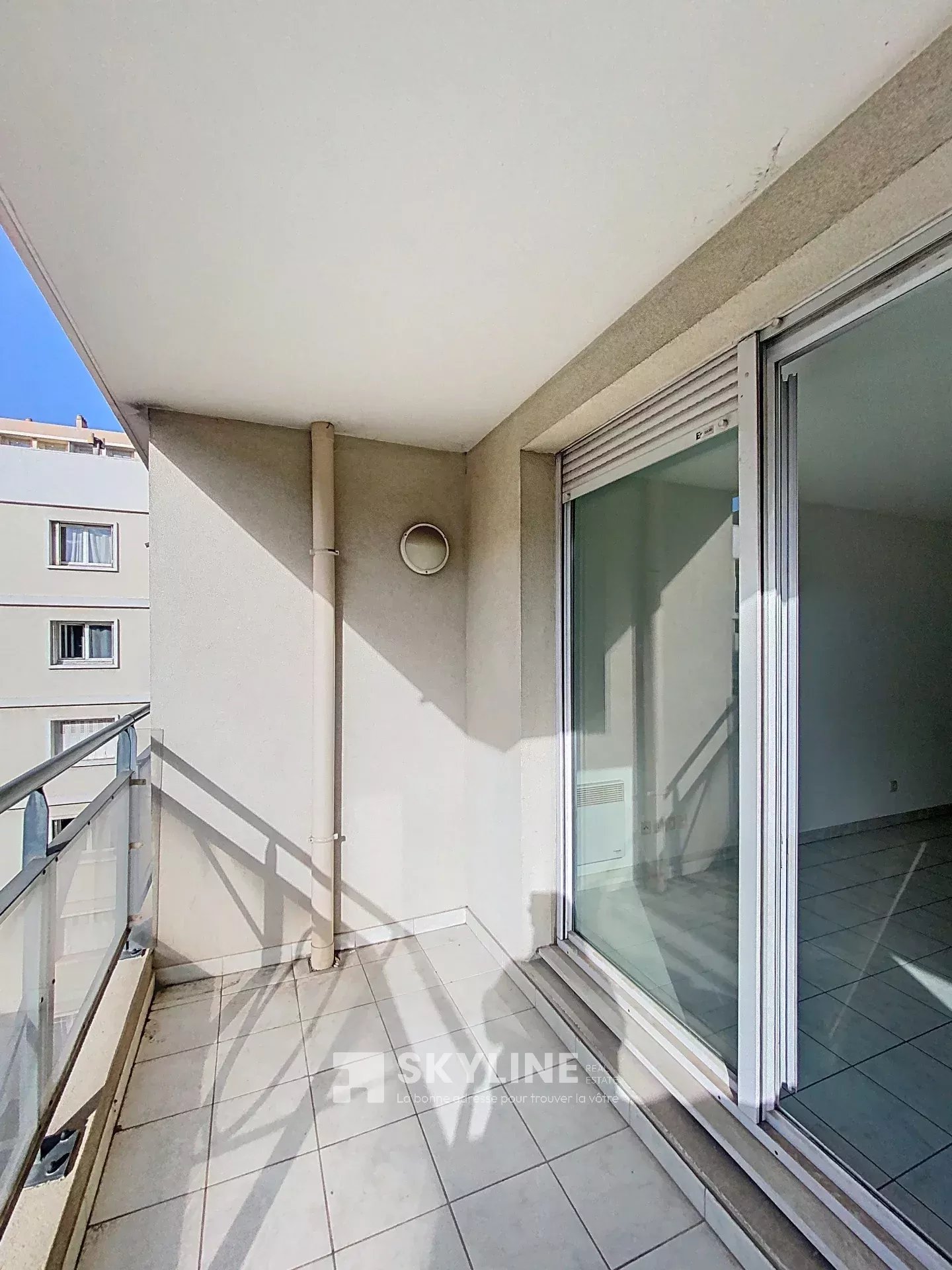 Photo 3 — SKYLINE REAL ESTATE