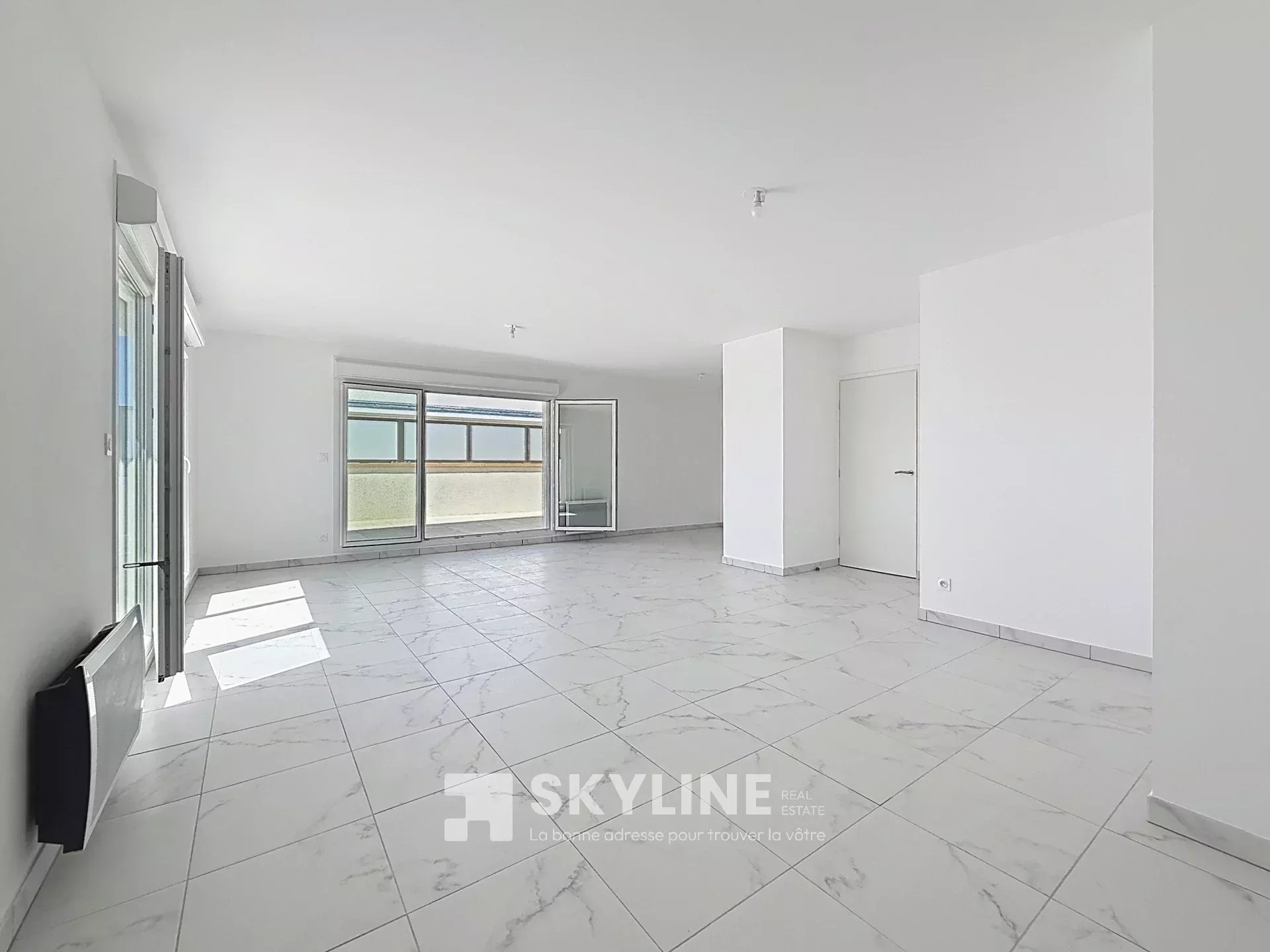 Photo 3 — SKYLINE REAL ESTATE