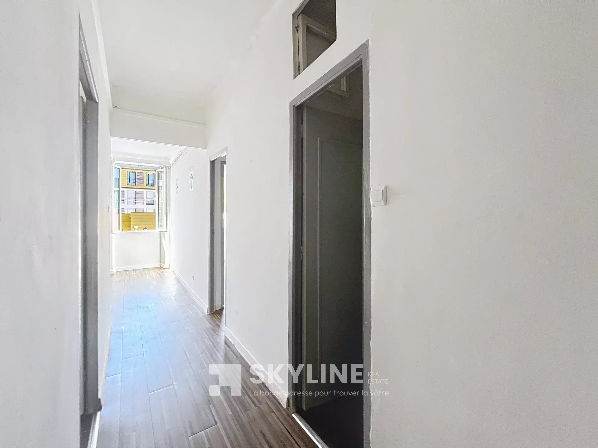 Photo 3 — SKYLINE REAL ESTATE