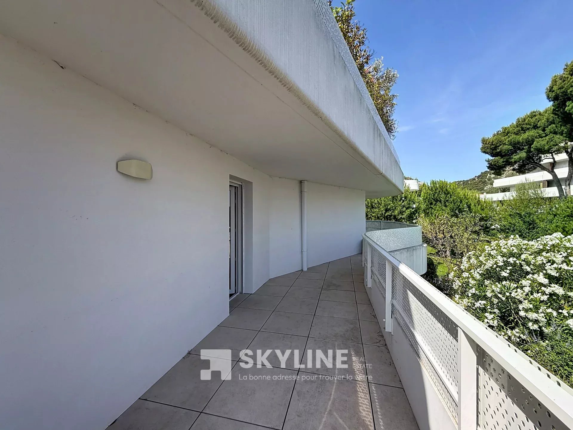 Photo 2 — SKYLINE REAL ESTATE
