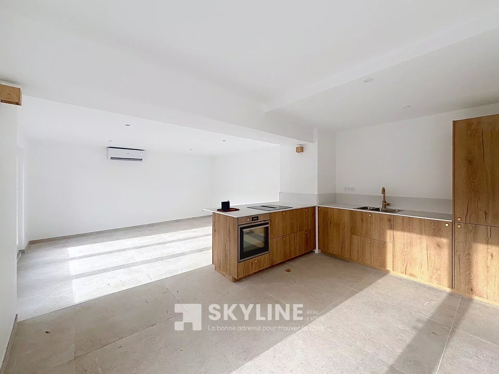 Photo 2 — SKYLINE REAL ESTATE