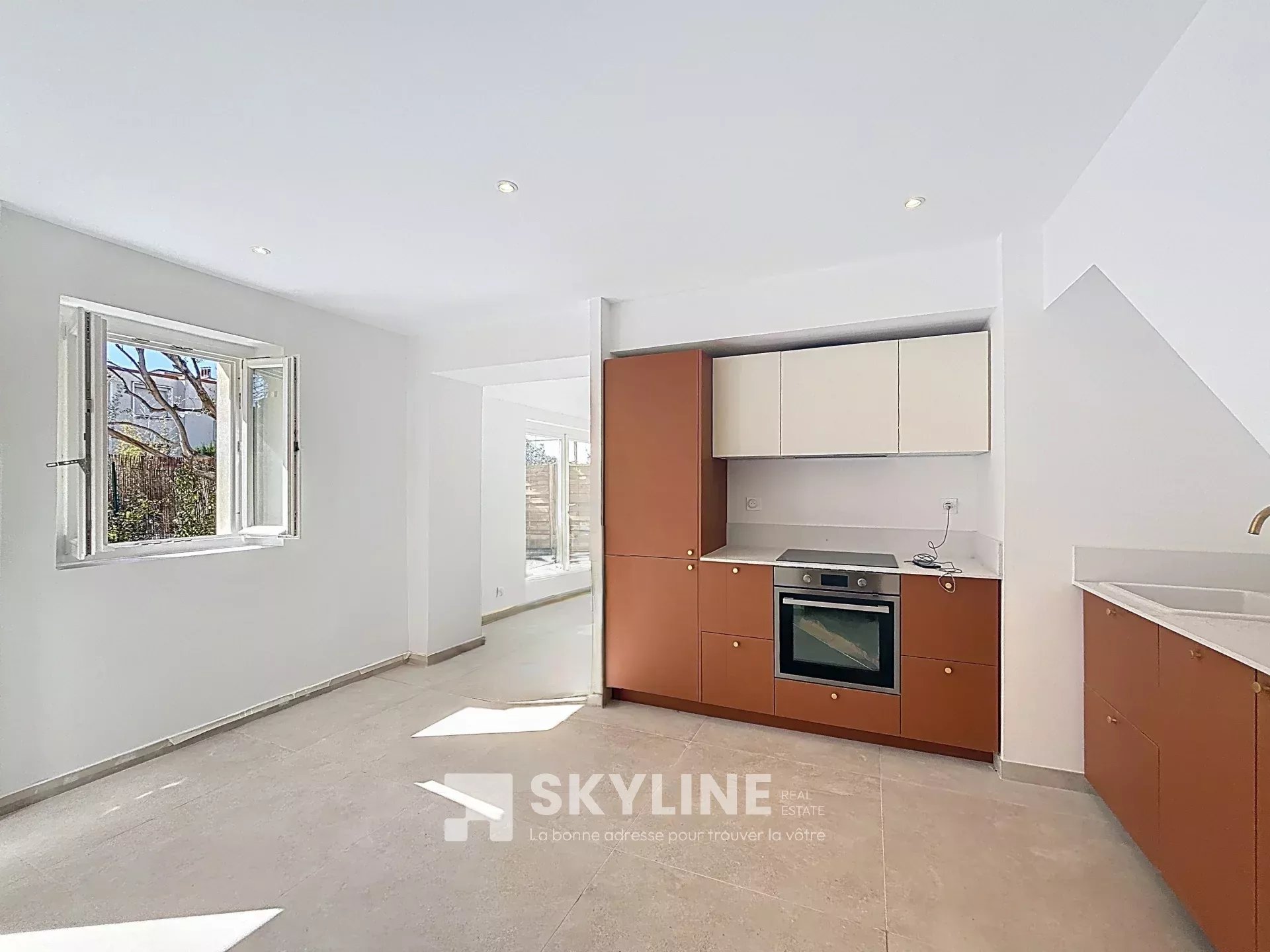 Photo 3 — SKYLINE REAL ESTATE