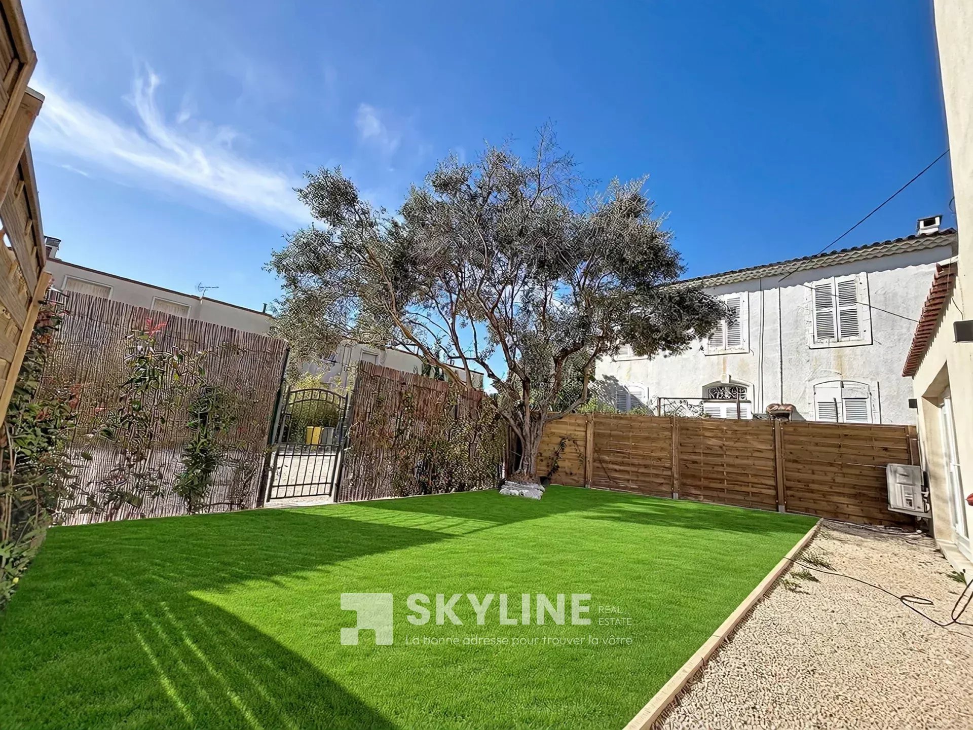 Photo 2 — SKYLINE REAL ESTATE