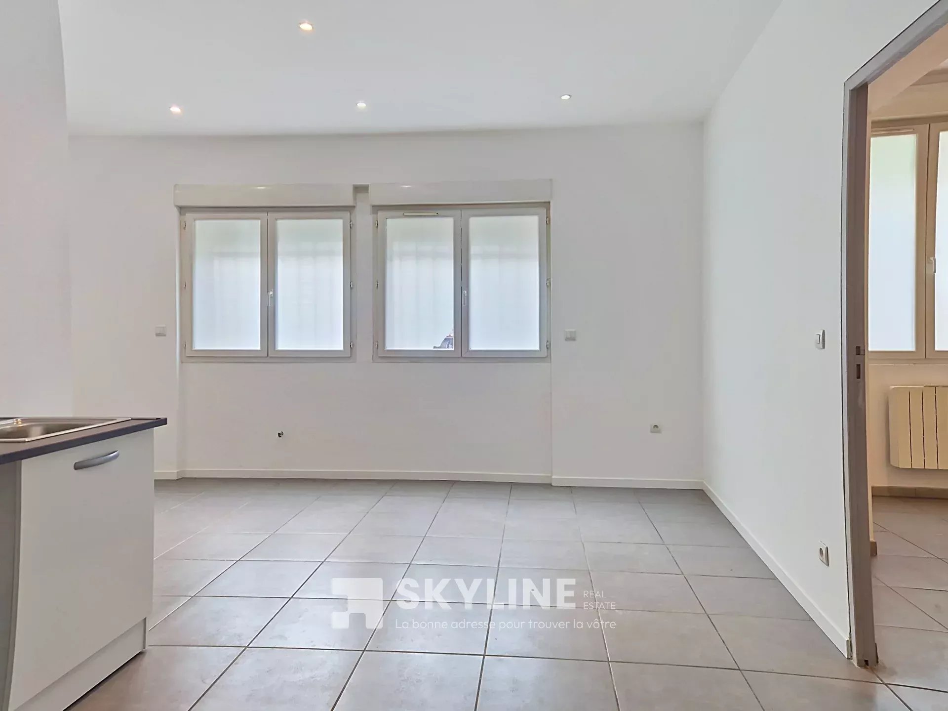 Photo 2 — SKYLINE REAL ESTATE