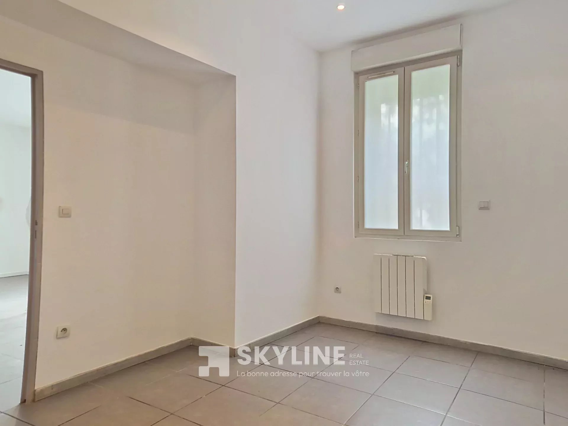 Photo 3 — SKYLINE REAL ESTATE