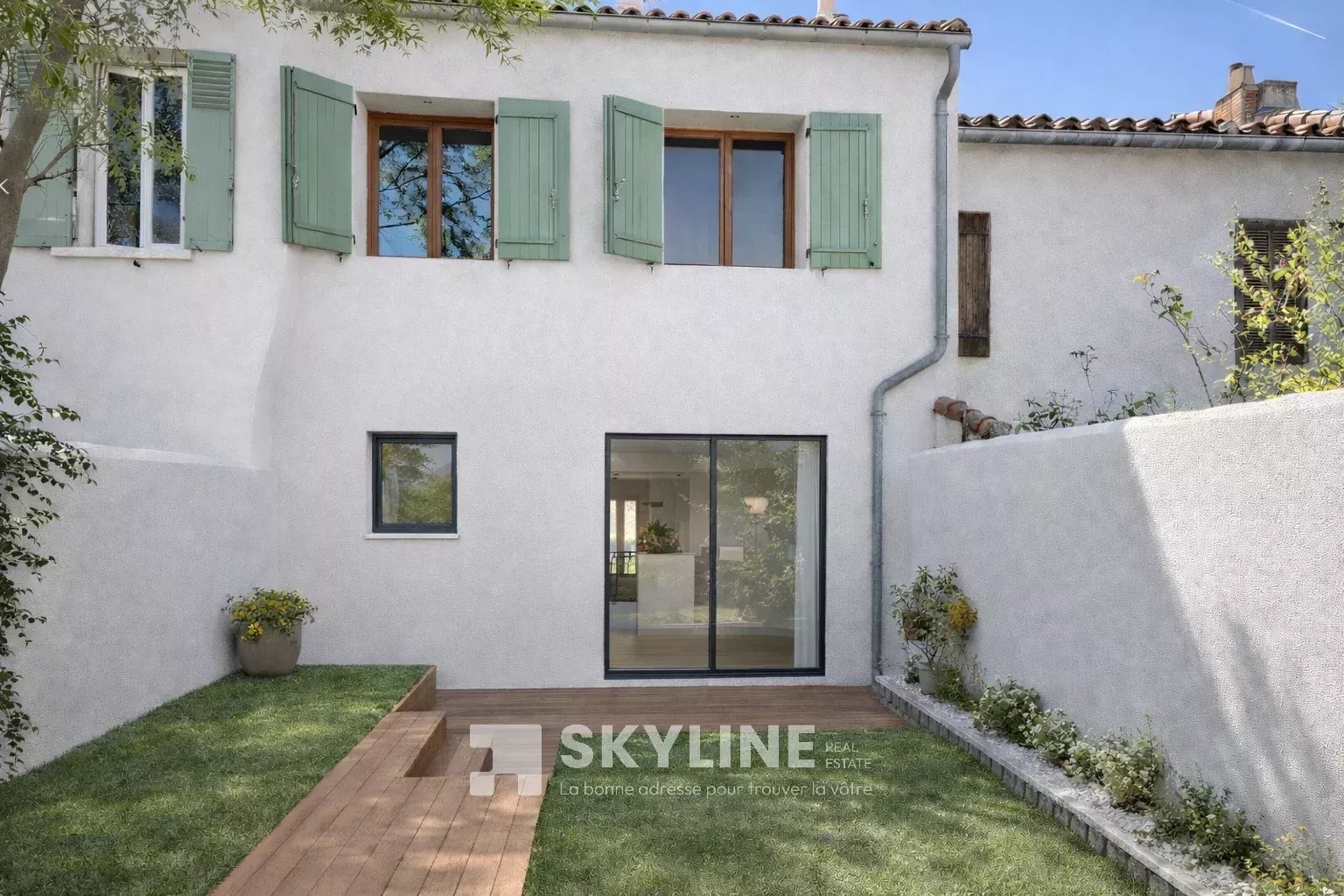 Photo 2 — SKYLINE REAL ESTATE