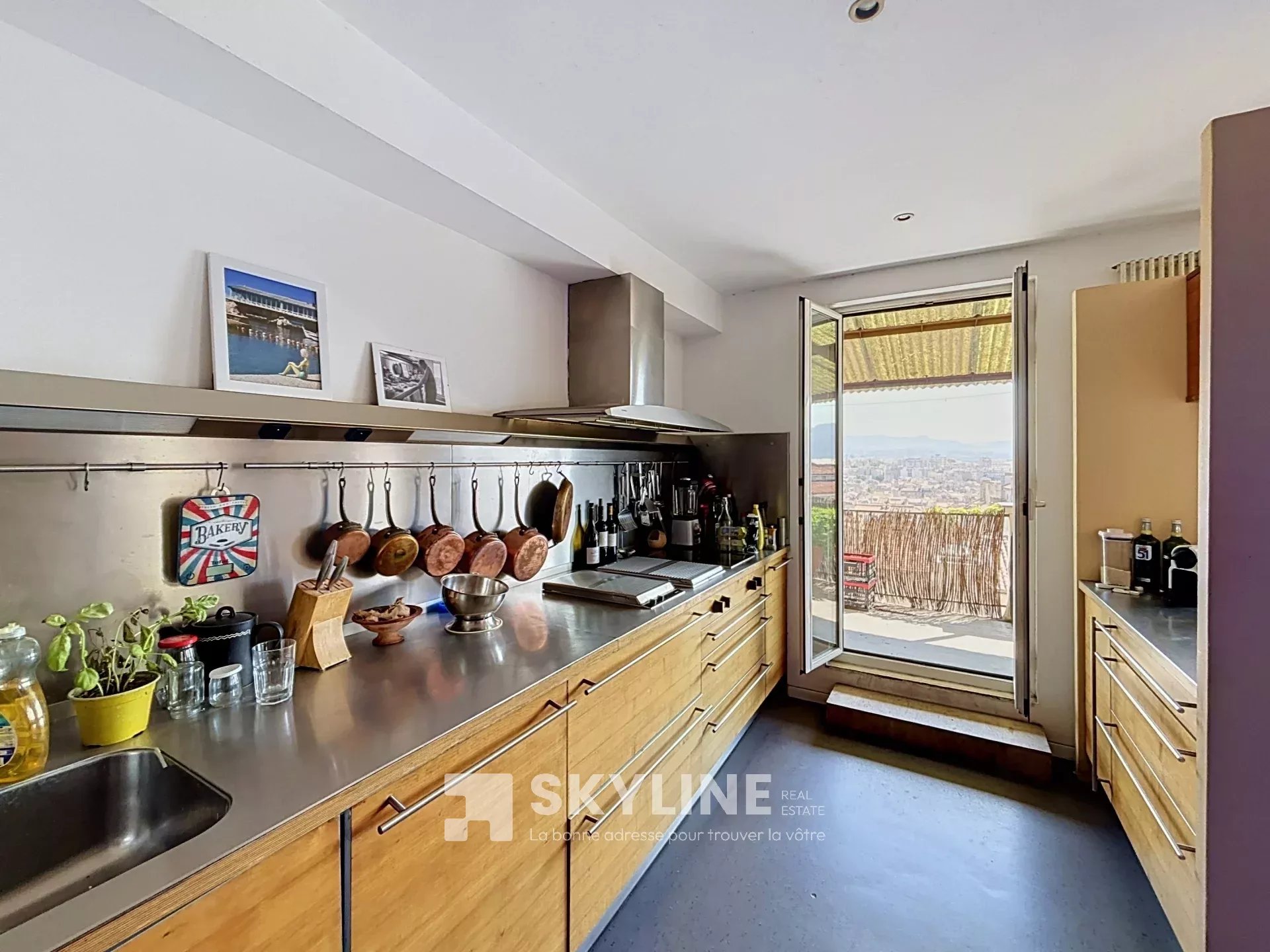 Photo 3 — SKYLINE REAL ESTATE