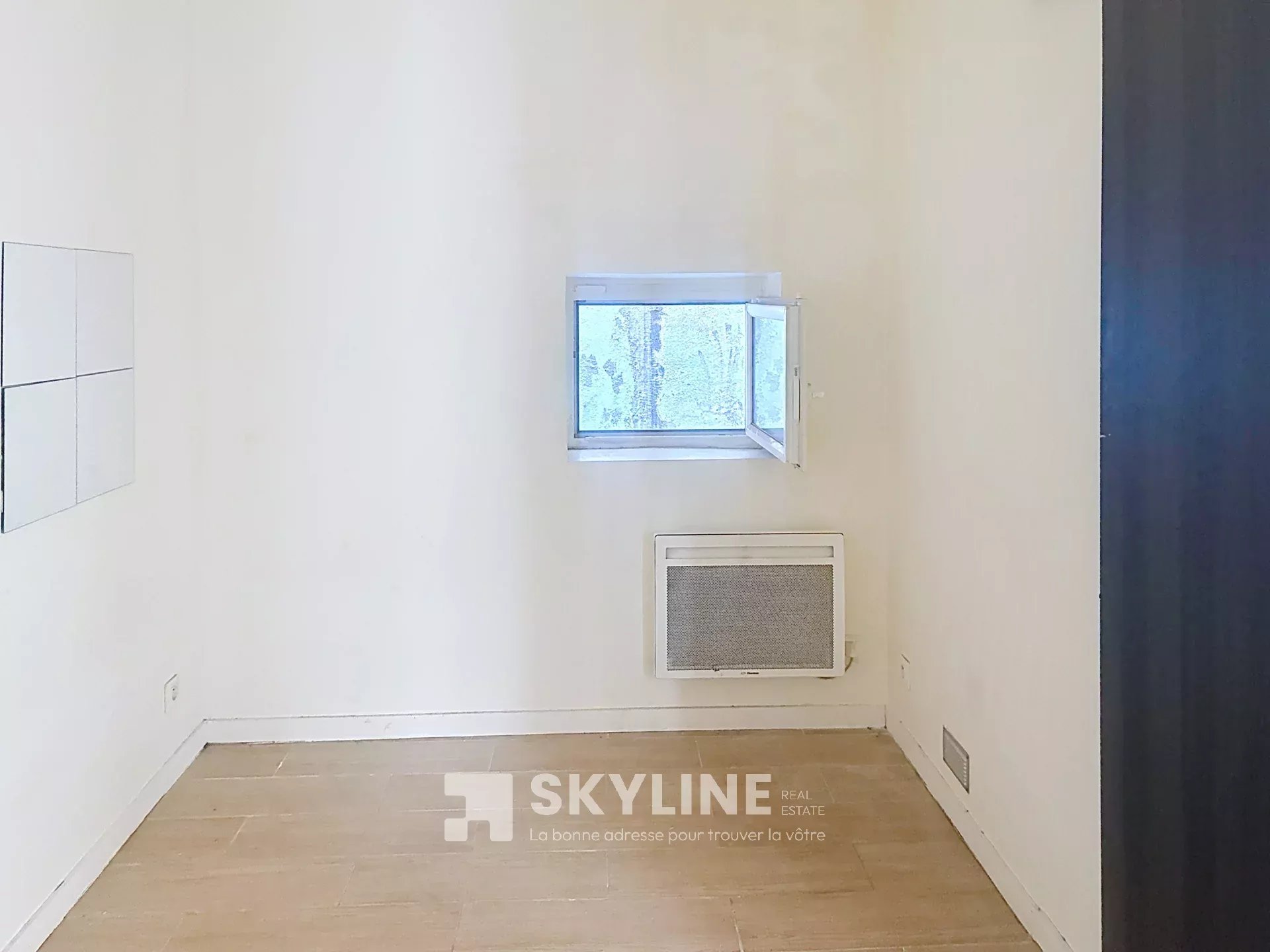 Photo 3 — SKYLINE REAL ESTATE