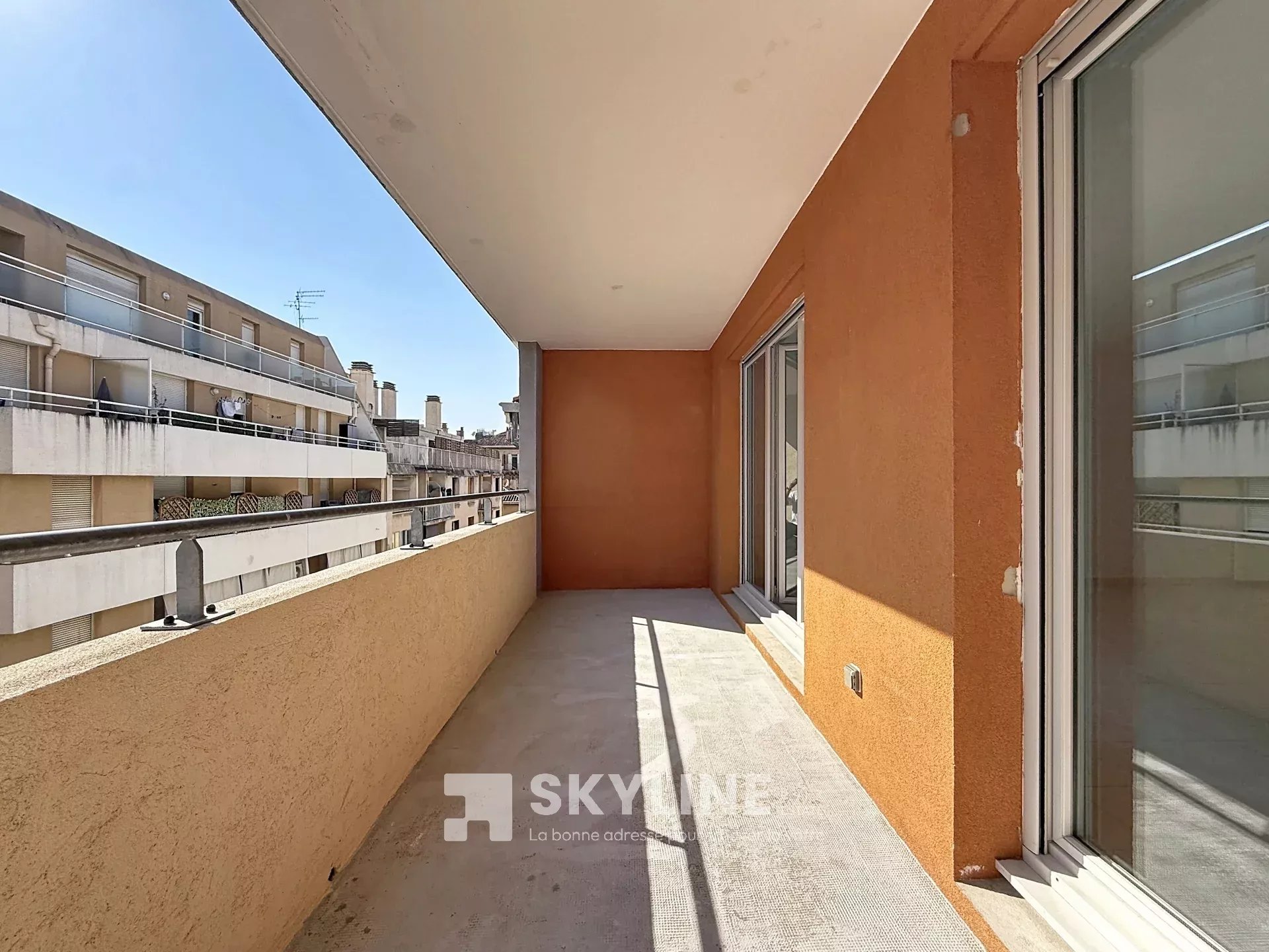 Photo 2 — SKYLINE REAL ESTATE