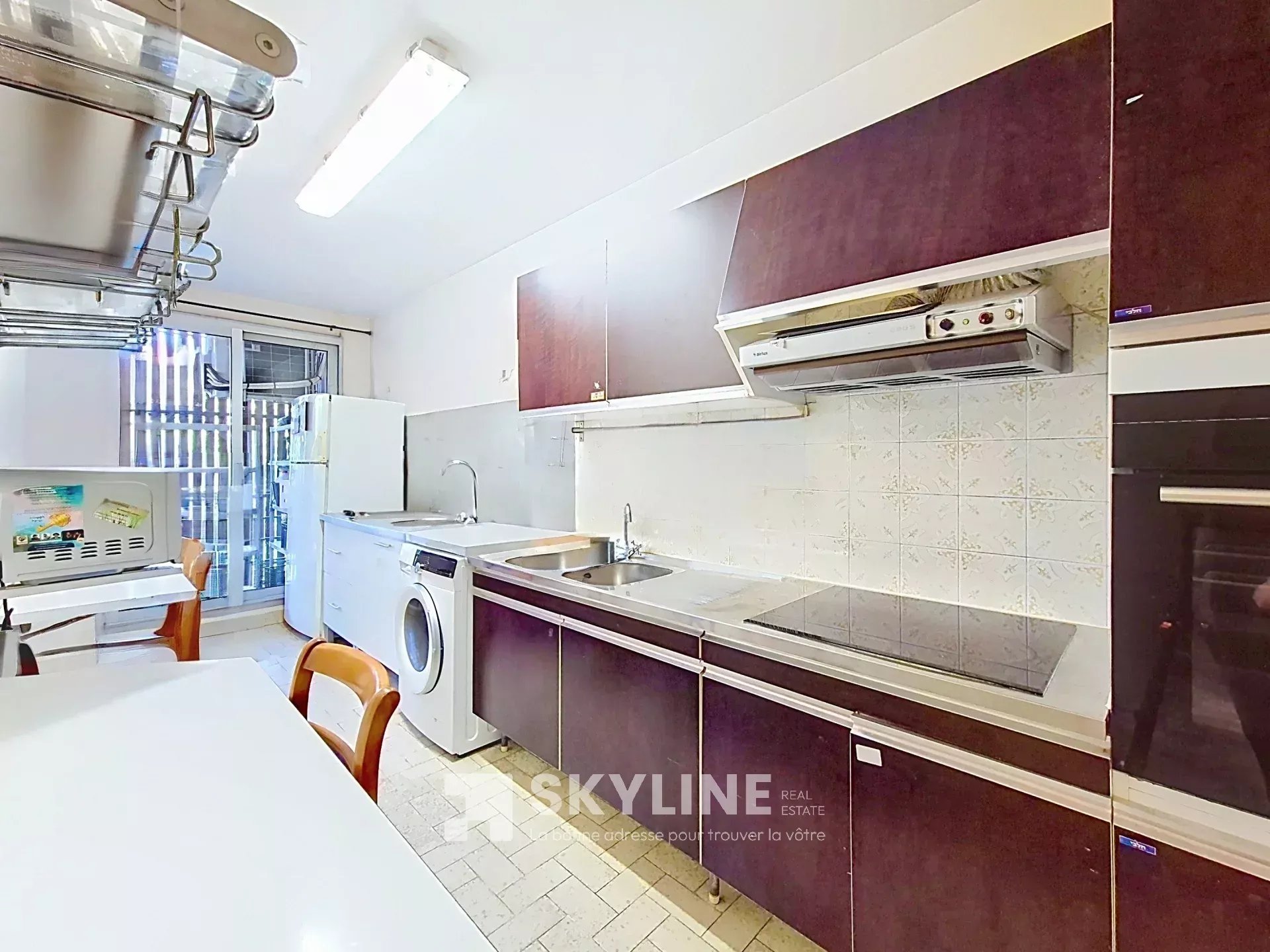 Photo 3 — SKYLINE REAL ESTATE