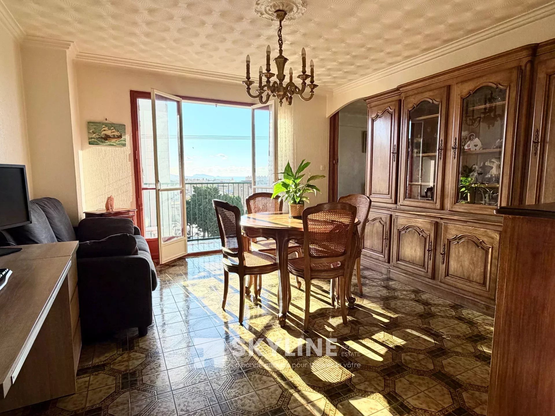 Photo 2 — SKYLINE REAL ESTATE