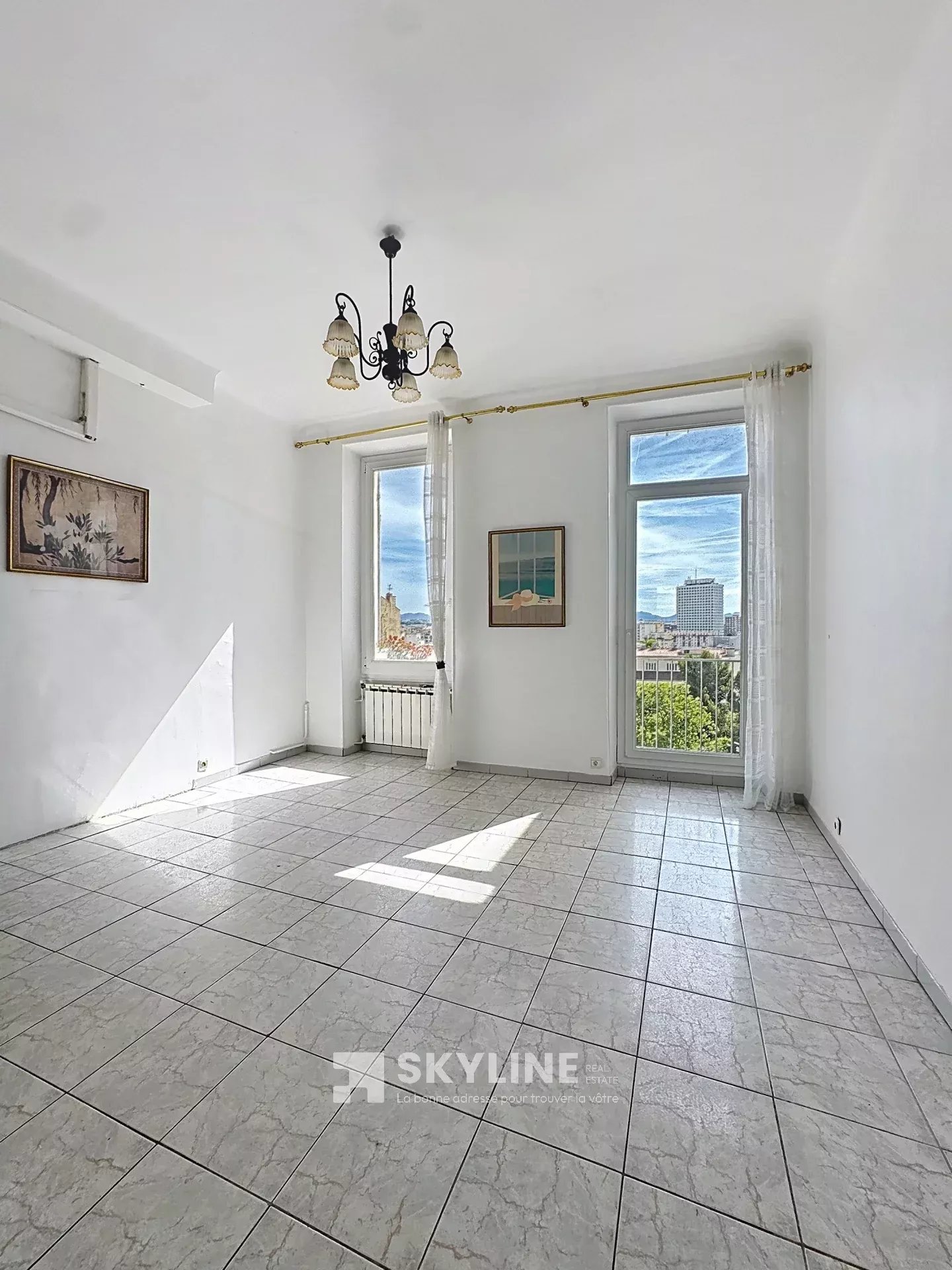 Photo 2 — SKYLINE REAL ESTATE