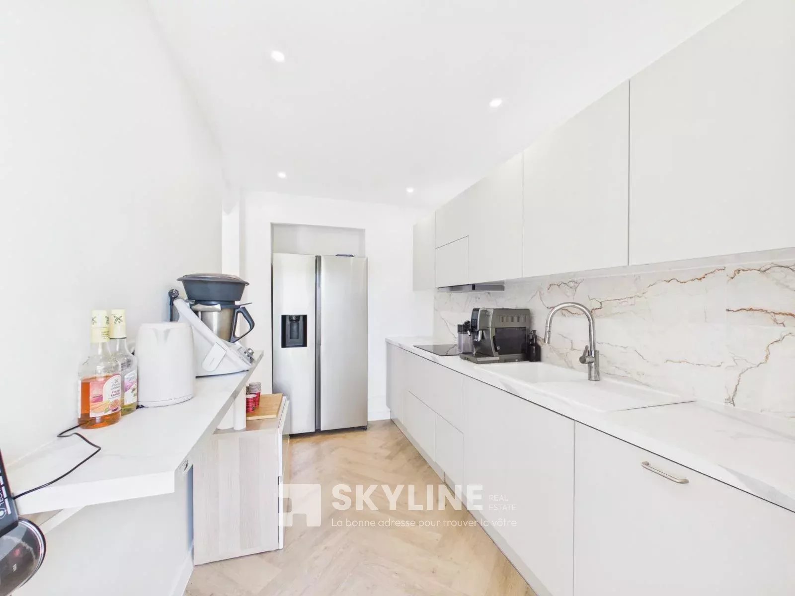 Photo 2 — SKYLINE REAL ESTATE