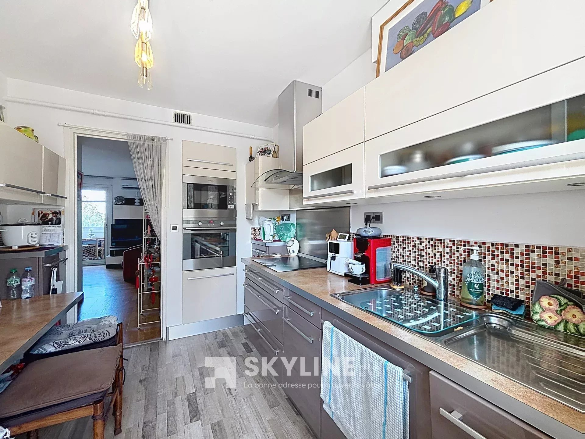 Photo 3 — SKYLINE REAL ESTATE