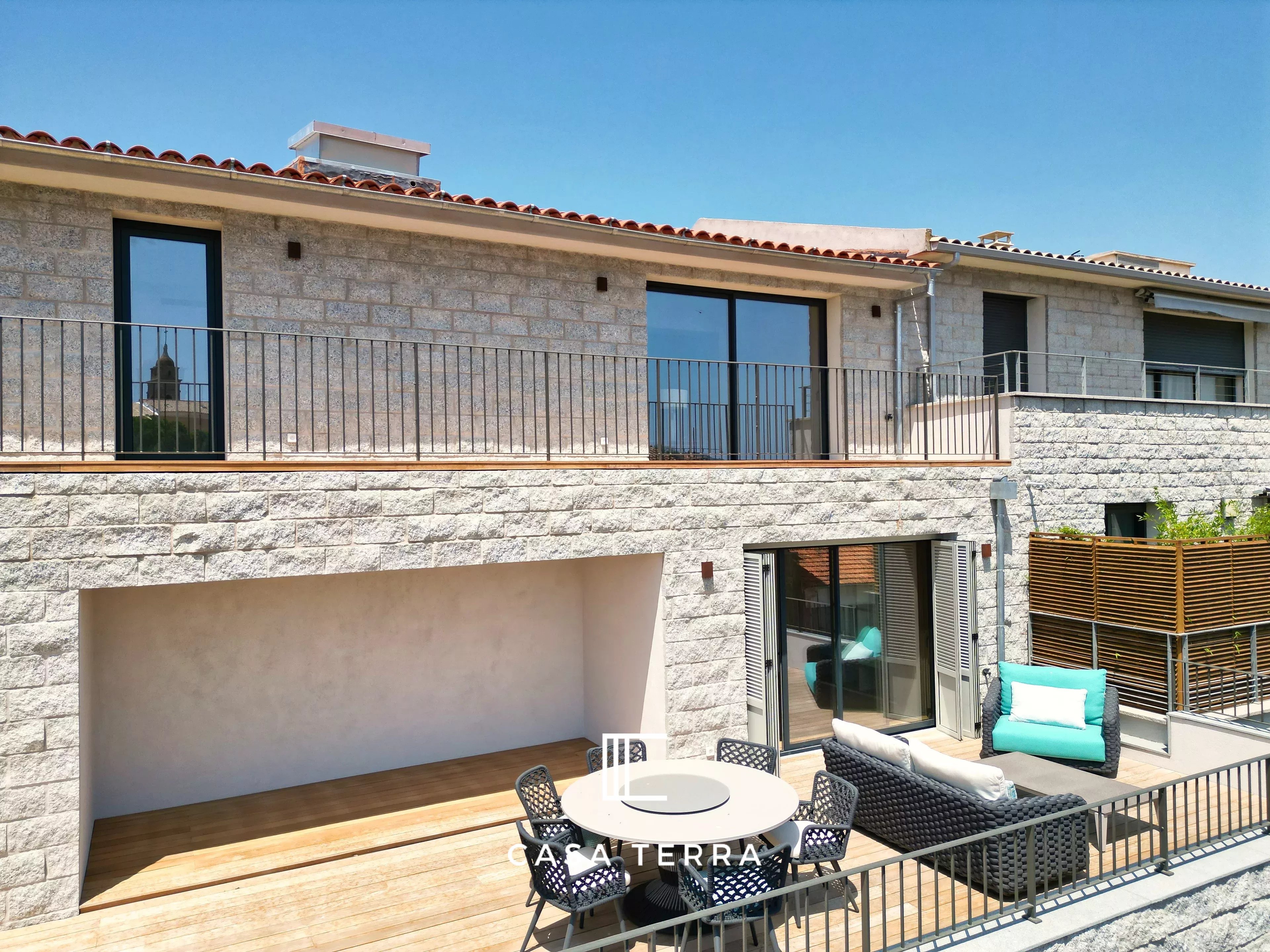Photo 2 — Casa Terra Real Estate